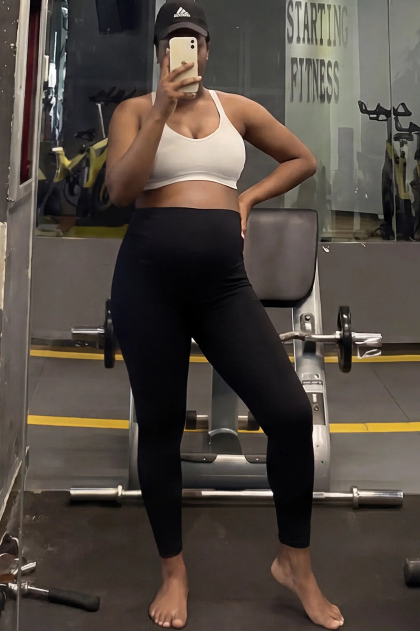 High Waist Full Panel Pocketed Maternity Leggings High Waist Full Panel Maternity Leggings in Black featuring side pockets on a pregnant woman.