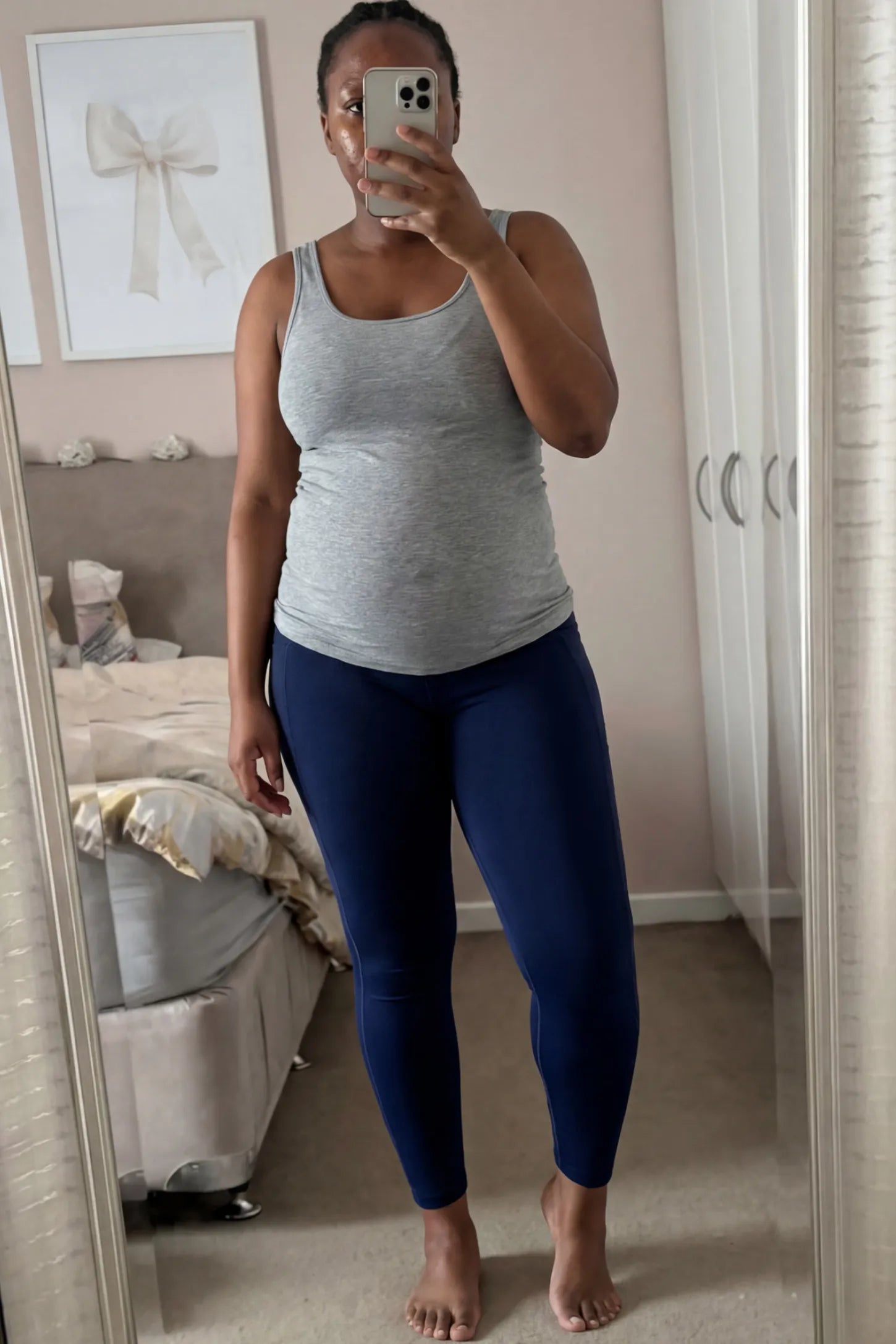 High Waist Full Panel Pocketed Maternity Leggings High Waist Full Panel Maternity Leggings in Navy Blue featuring side pockets on a pregnant woman.