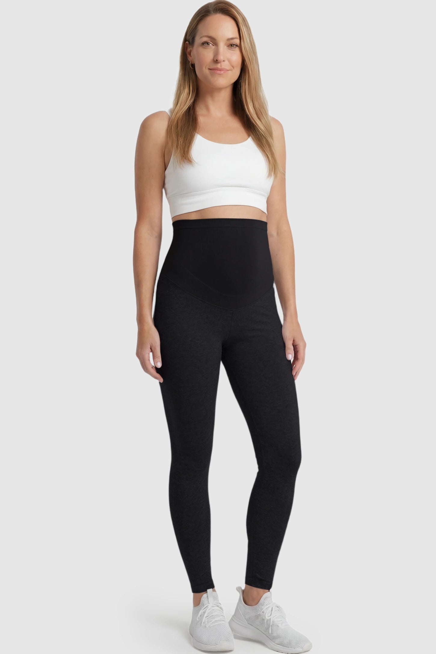 High Waist Full Panel Stretch Fit Maternity Leggings High Waist Full Panel Stretch Fit Maternity Leggings in Black featuring a seamless over-the-belly panel on a postpartum model.