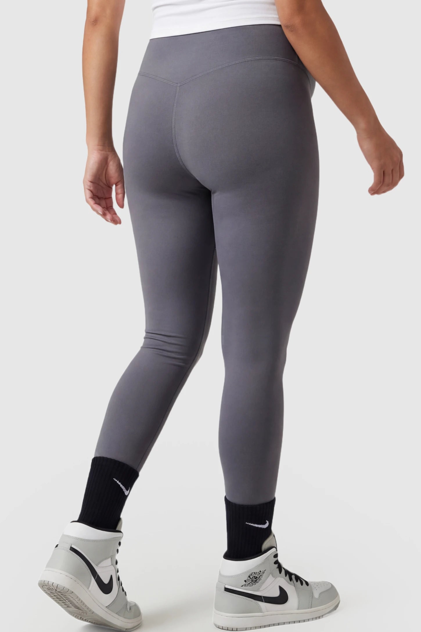 High Waist Slim Fit Maternity Leggings High Waist Slim Fit Maternity Leggings in gray featuring slim fit on a pregnant model back view.