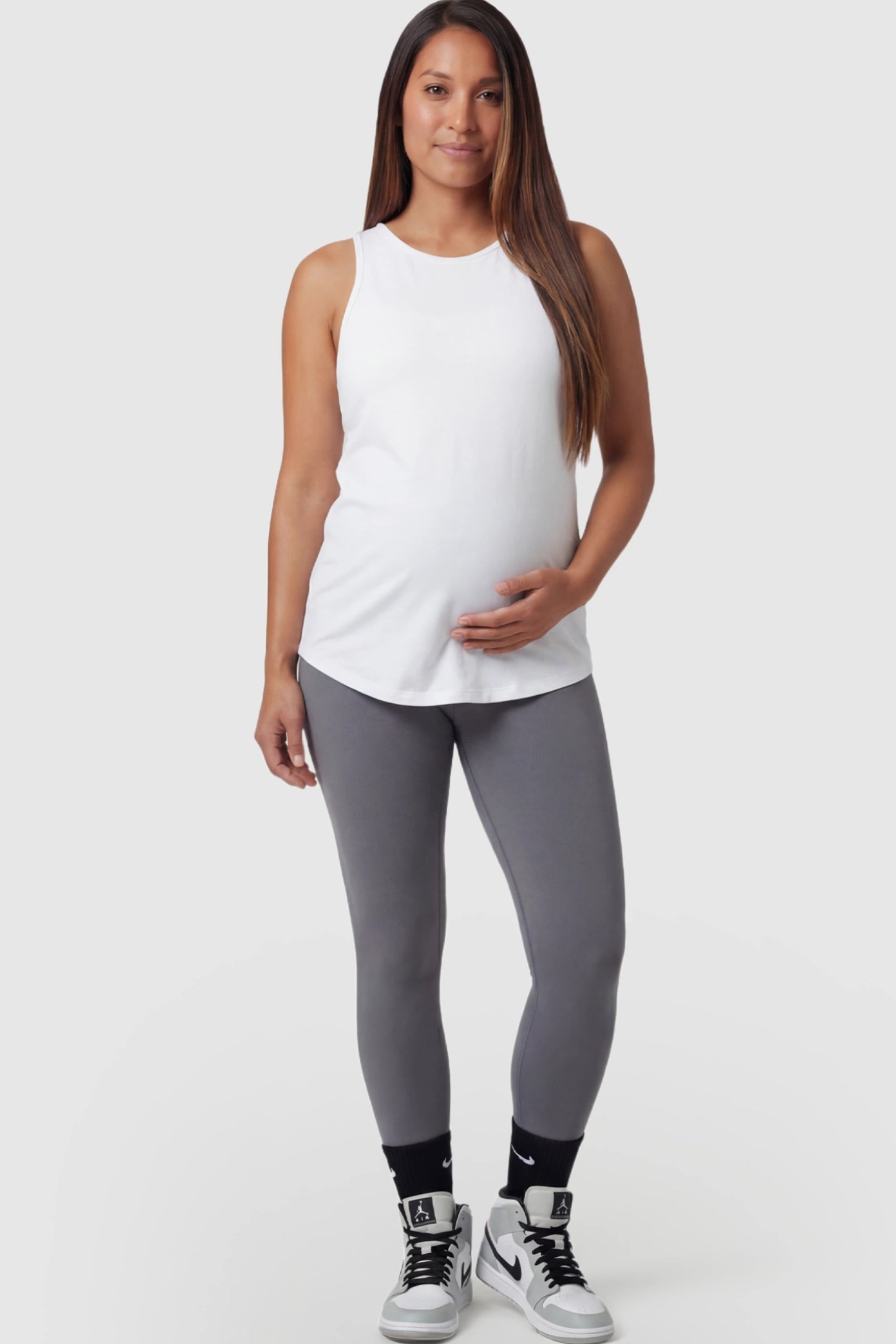 High Waist Slim Fit Maternity Leggings High Waist Slim Fit Maternity Leggings in Gray featuring a seamless full-panel on a pregnant model front view.
