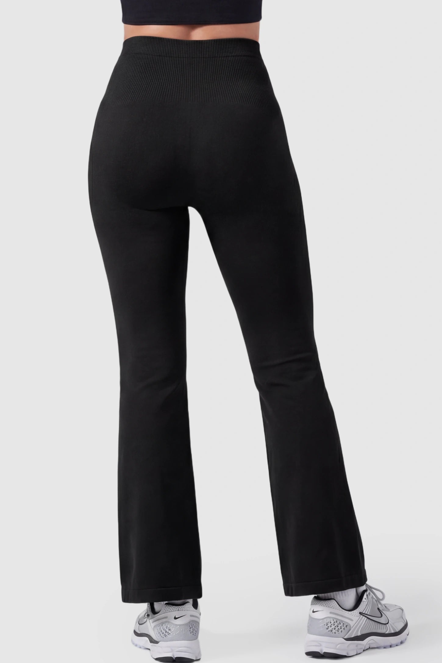 High Waisted Flare Leg Maternity Pants High Waisted Flare Leg Maternity Pants in black on a pregnant model.