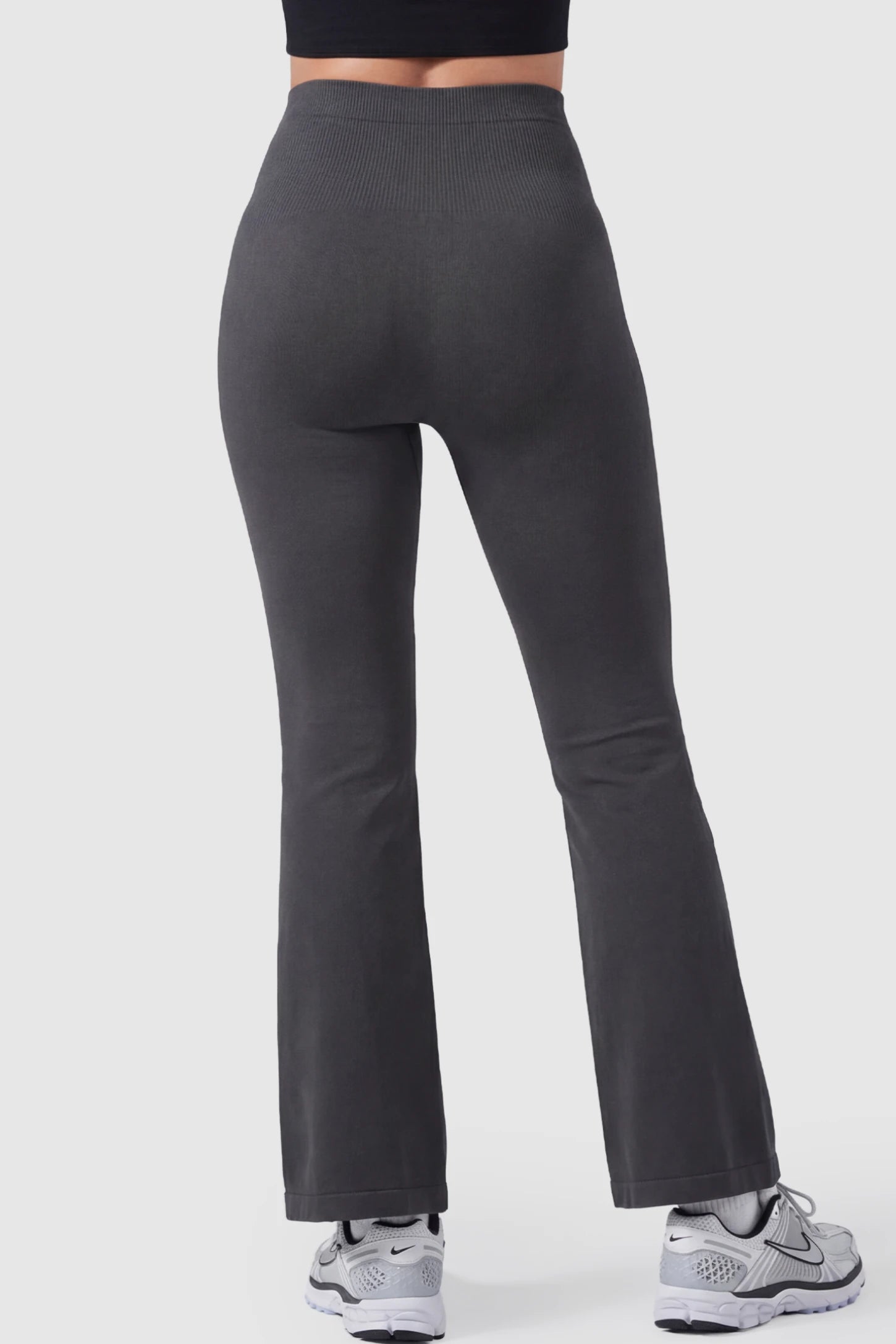 High Waisted Flare Leg Maternity Pants High Waisted Flare Leg Maternity Pants in gray on a pregnant model.