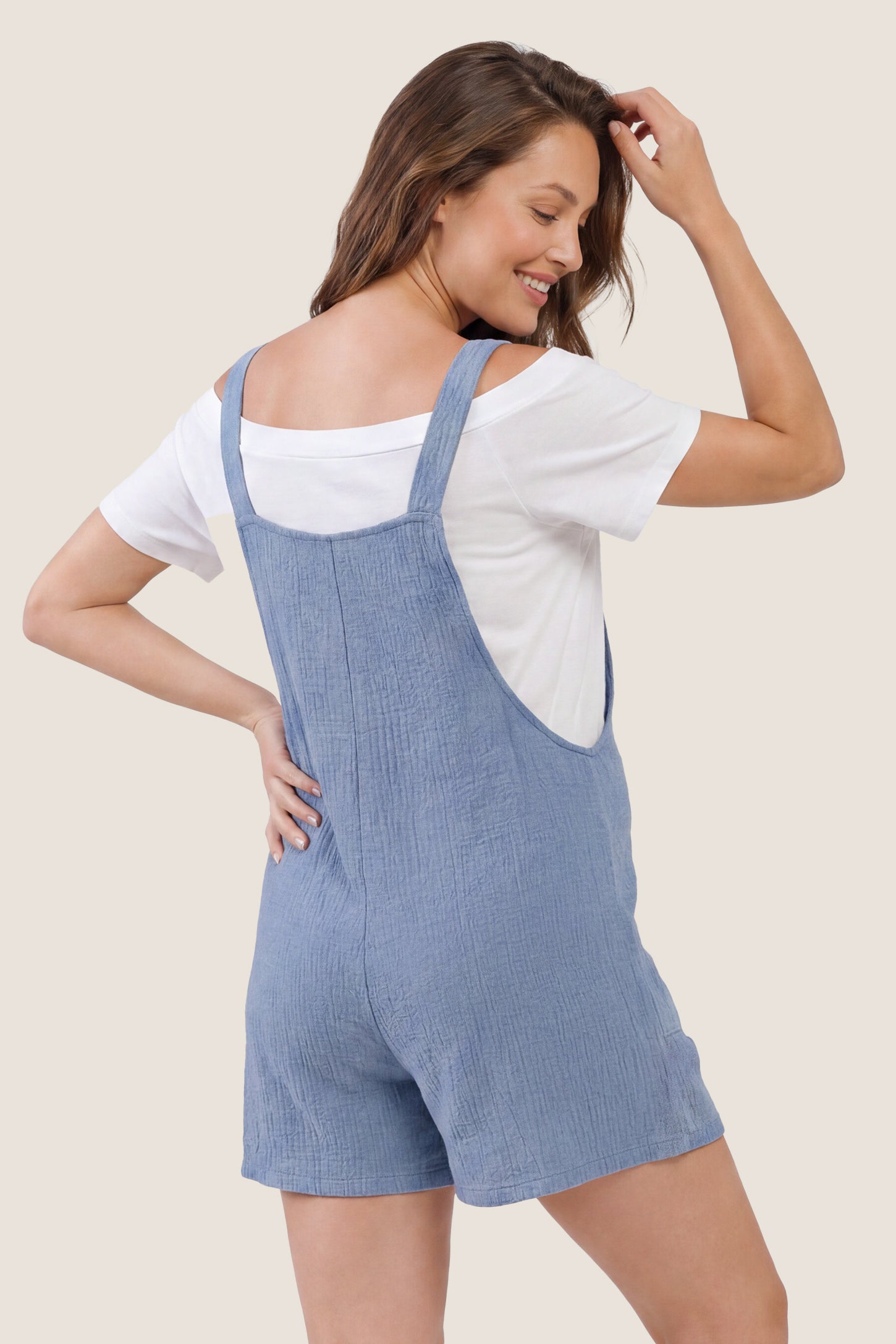 Knot Strap Front Pocket Maternity Romper Knot Strap Front Pocket Maternity Romper in Light Blue featuring a sleeveless silhouette with wide straps on a model, back view.
