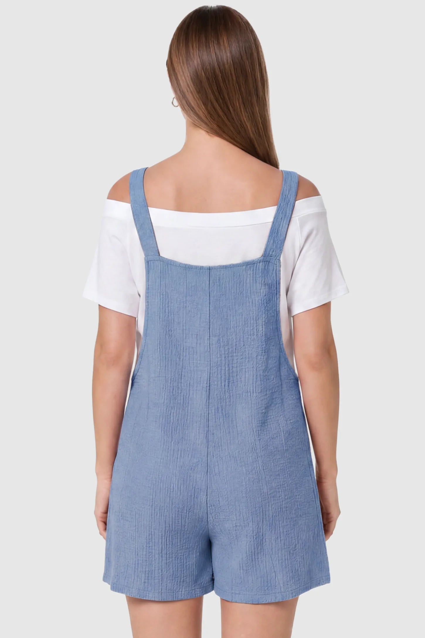 Knot Strap Front Pocket Maternity Romper Knot Strap Front Pocket Maternity Romper in Light Blue featuring a sleeveless silhouette with wide straps on a model, back view.