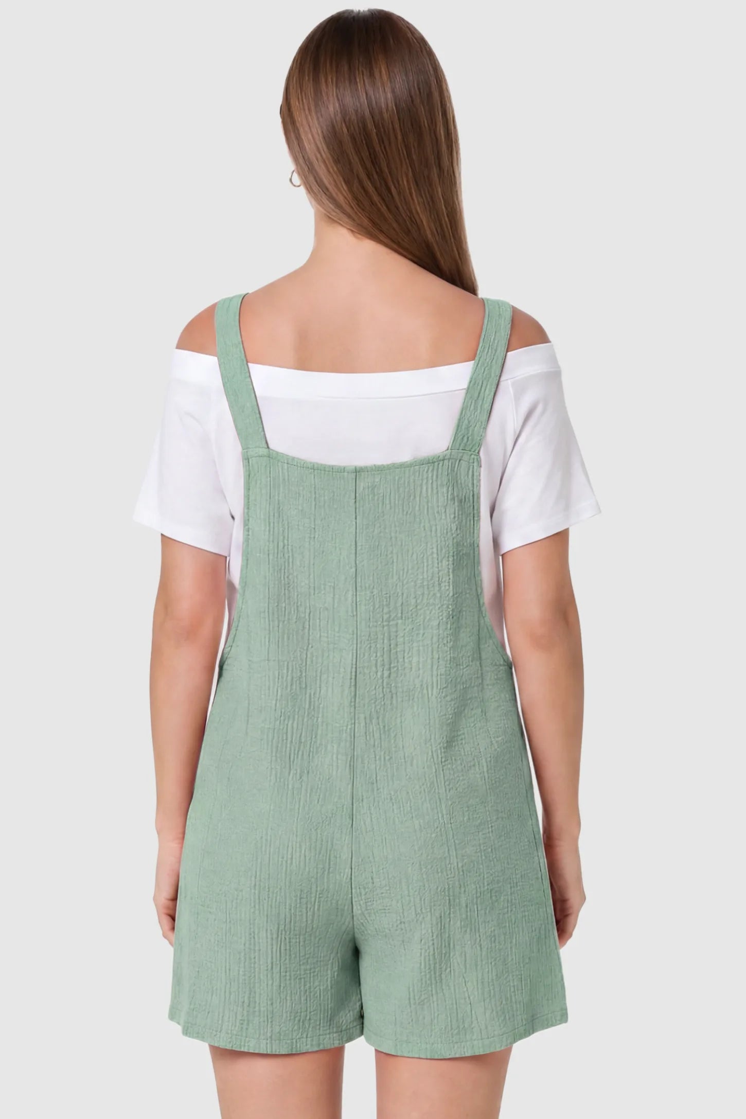 Knot Strap Front Pocket Maternity Romper Knot Strap Front Pocket Maternity Romper in Light Green featuring a sleeveless silhouette with wide straps on a model, back view.