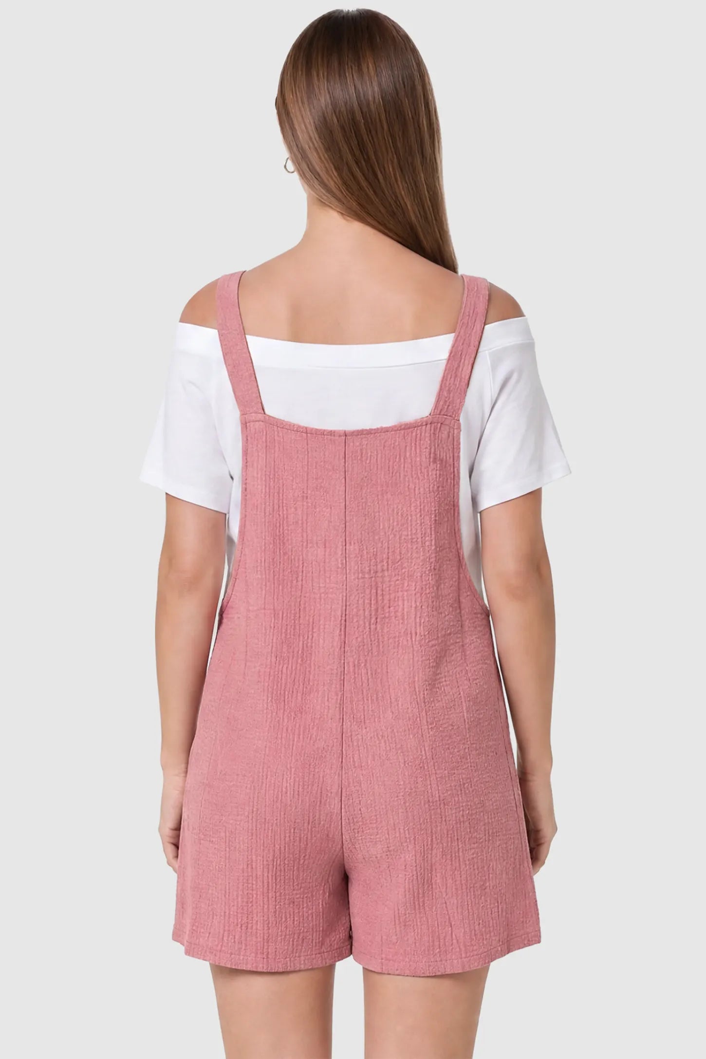 Knot Strap Front Pocket Maternity Romper Knot Strap Front Pocket Maternity Romper in Pink featuring a sleeveless silhouette with wide straps on a model, back view.