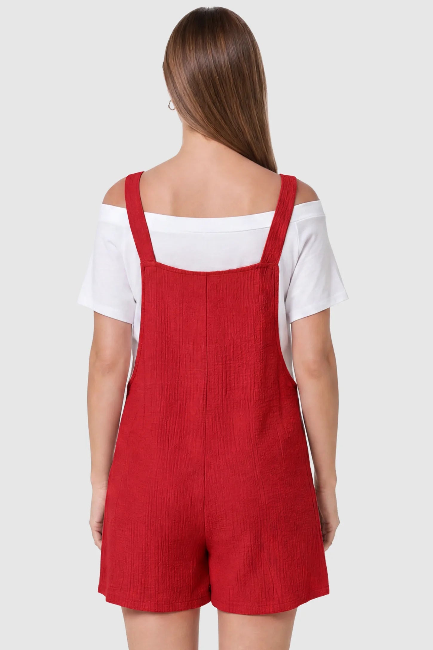 Knot Strap Front Pocket Maternity Romper Knot Strap Front Pocket Maternity Romper in Red featuring a sleeveless silhouette with wide straps on a model, back view.