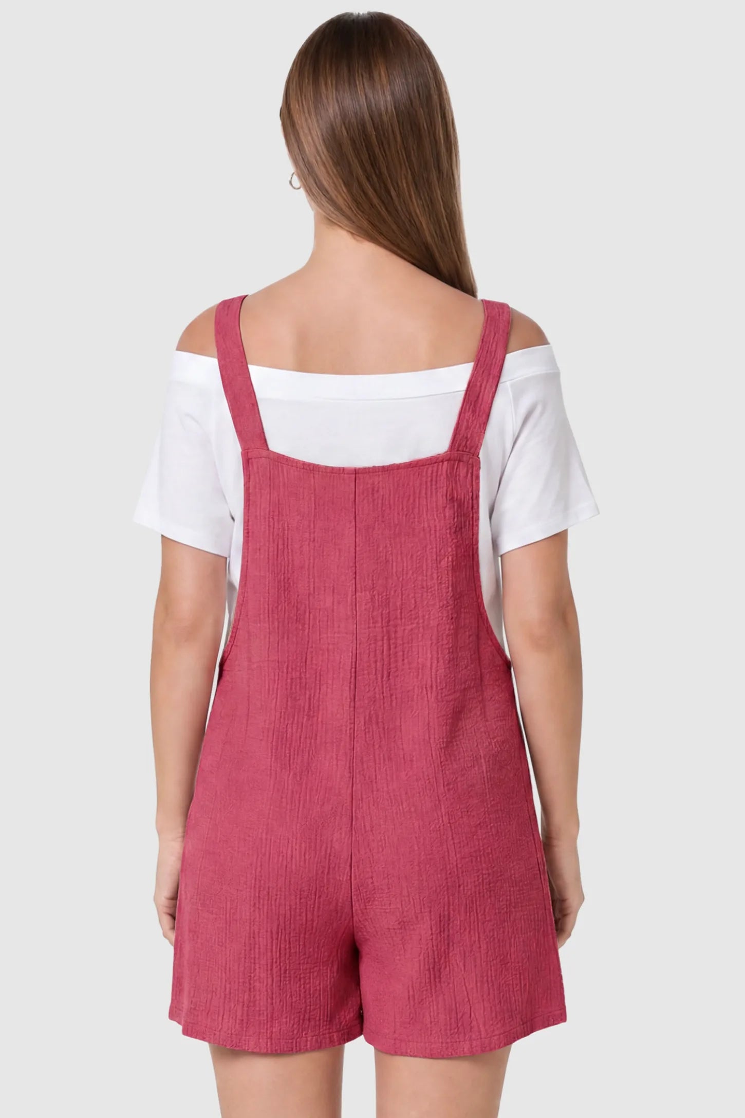 Knot Strap Front Pocket Maternity Romper Knot Strap Front Pocket Maternity Romper in Rose Red featuring a sleeveless silhouette with wide straps on a model, back view.