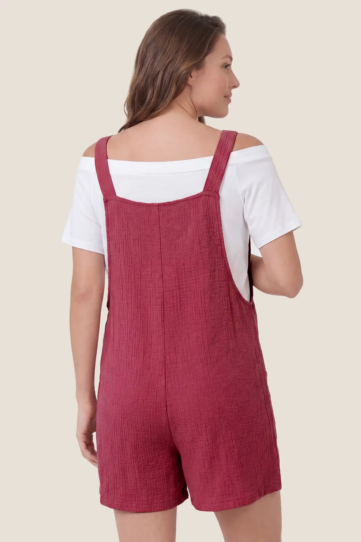 Knot Strap Front Pocket Maternity Romper Back view of the rose red Knot Strap Front Pocket Maternity Romper with knot shoulder straps and a relaxed fit.