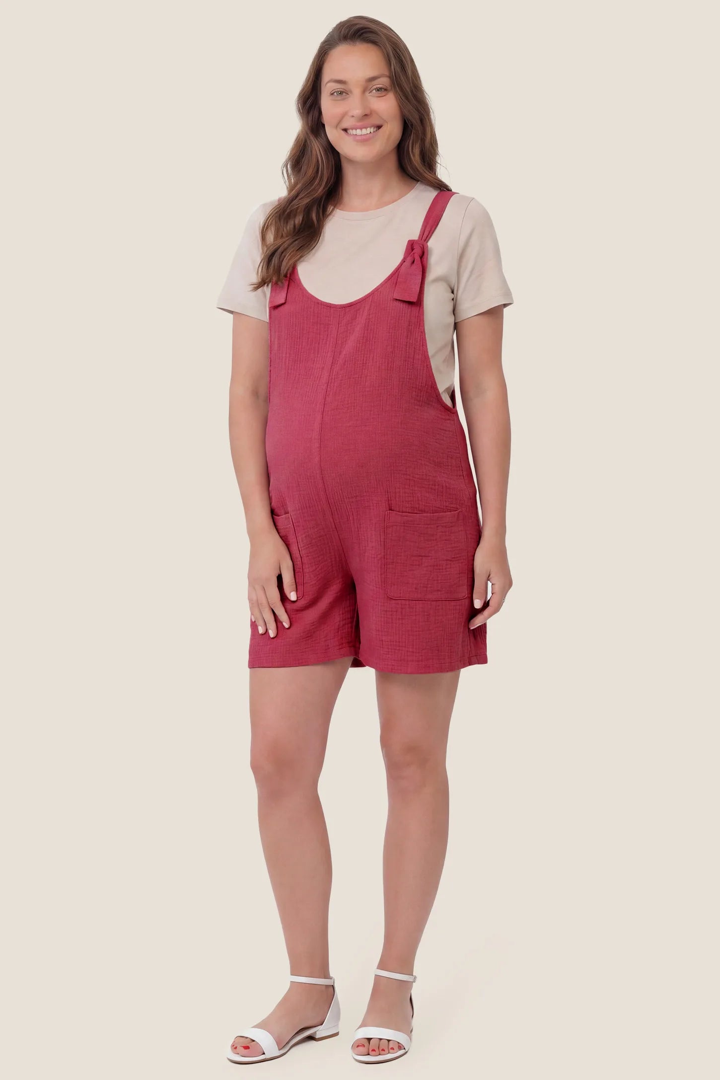Knot Strap Front Pocket Maternity Romper Full body view of the rose red Knot Strap Front Pocket Maternity Romper styled for casual everyday maternity wear.
