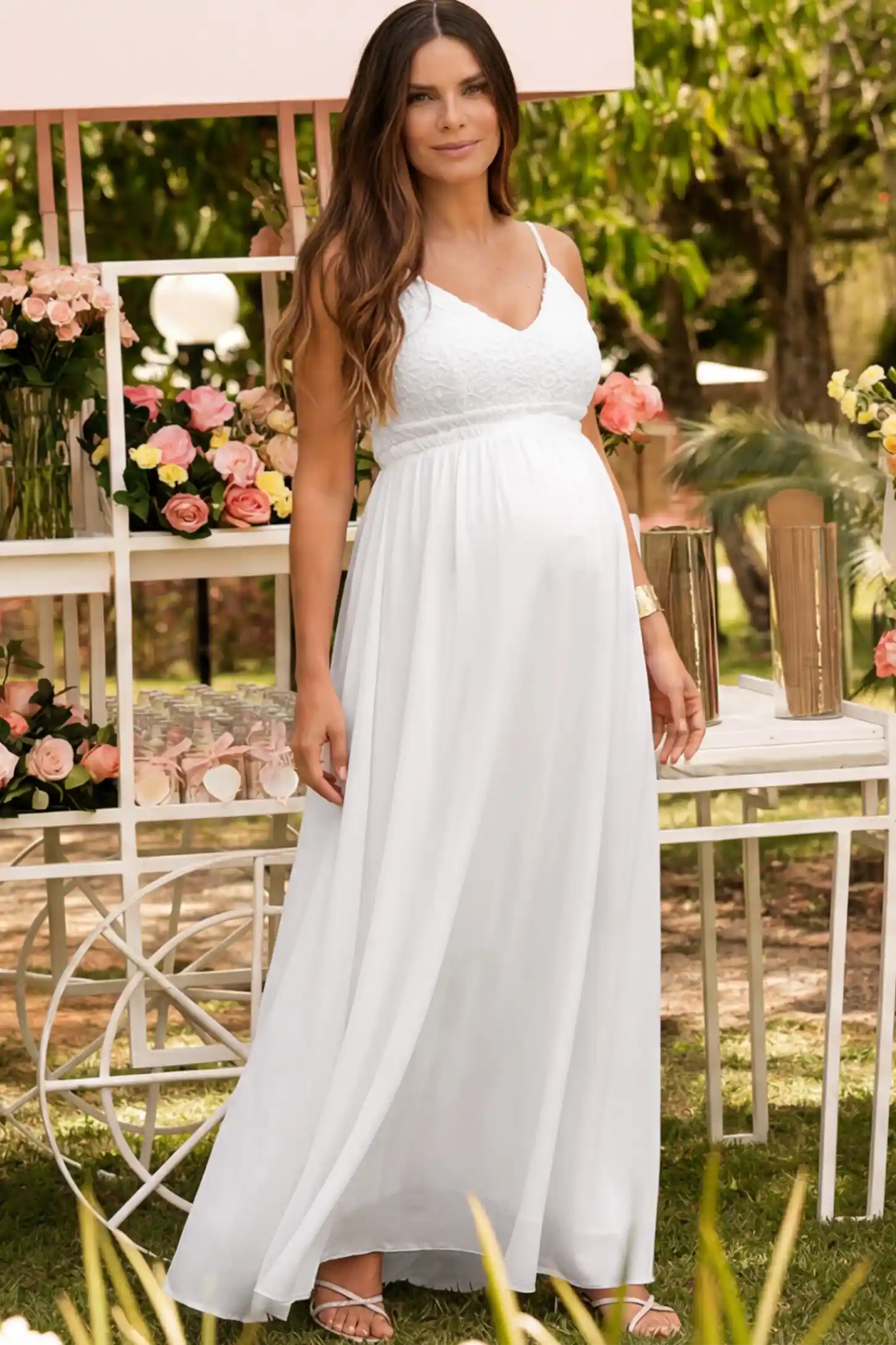 Lace Bodice V-Neck Maternity Maxi Dress in White featuring a floral lace overlay and spaghetti straps on a pregnant woman.
