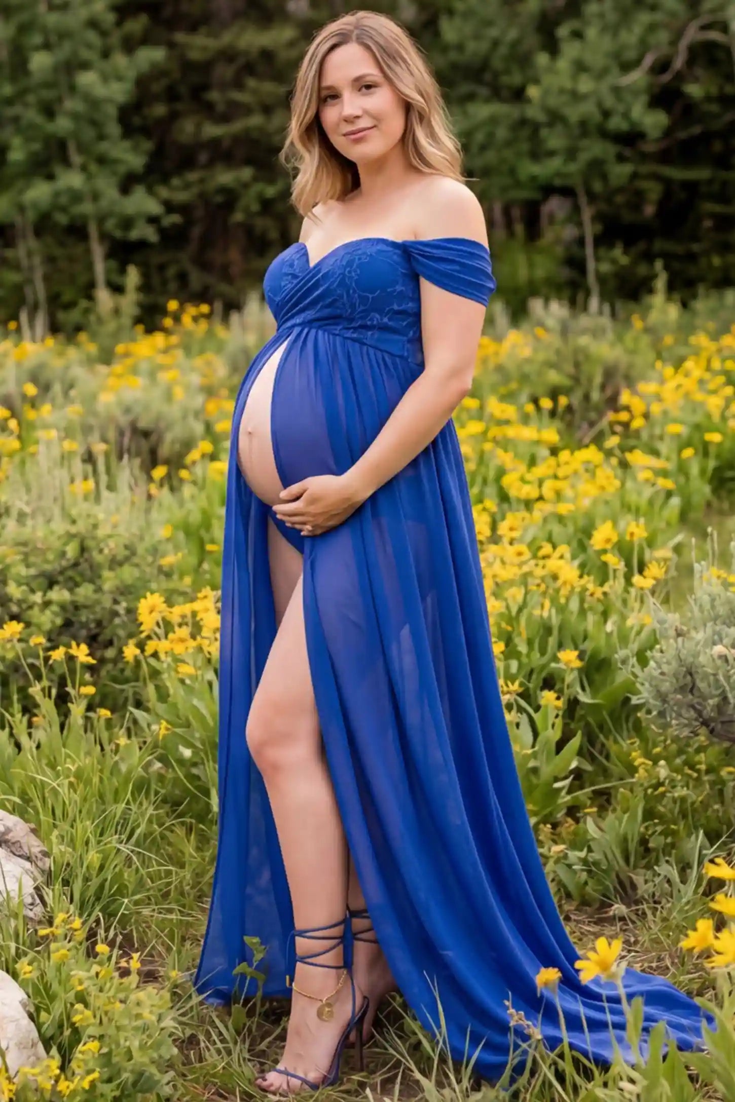 Lace Off Shoulder Slit Front Maternity Gown Lace Off Shoulder Slit Front Maternity Gown in Blue featuring off shoulder and high slit front on a pregnant woman during outdoor photoshoot.