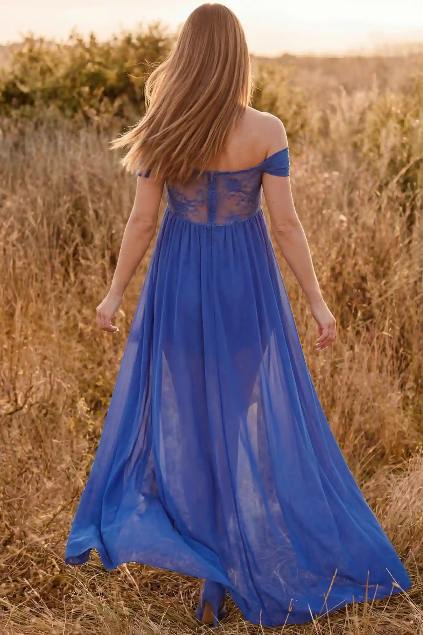 Lace Off Shoulder Slit Front Maternity Gown Lace Off Shoulder Slit Front Maternity Gown in Blue featuring off shoulder and flowy chiffon on a pregnant model showing back.