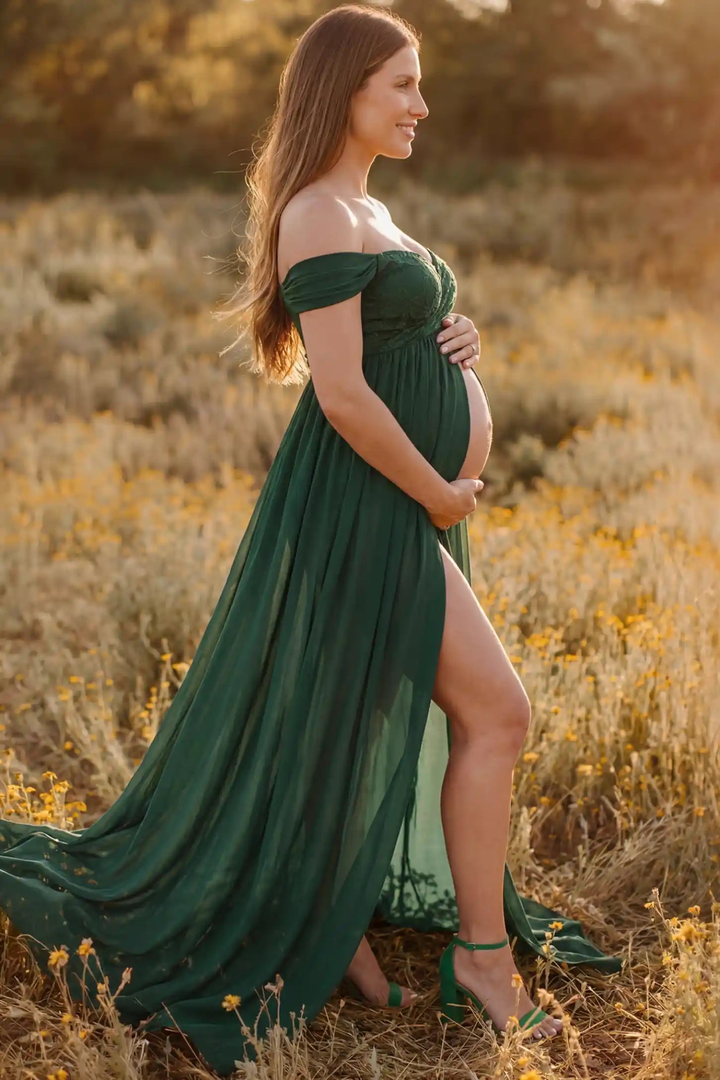 Lace Off Shoulder Slit Front Maternity Gown Lace Off Shoulder Slit Front Maternity Gown in Dark Green featuring off shoulder and flowy chiffon on a pregnant model showing side.