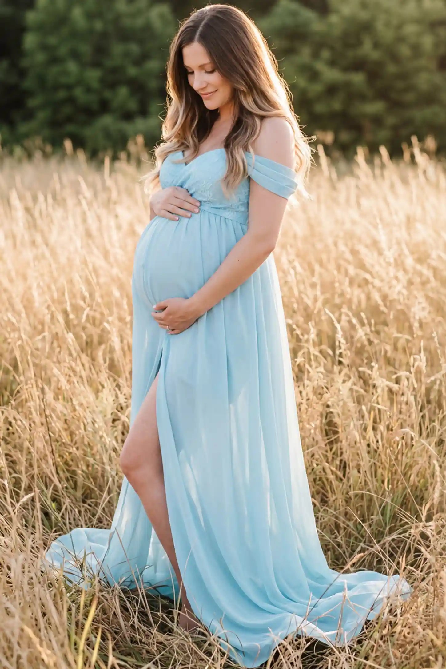 Lace Off Shoulder Slit Front Maternity Gown Lace Off Shoulder Slit Front Maternity Gown in Light Blue featuring off shoulder and high slit front on a pregnant woman during outdoor photoshoot.