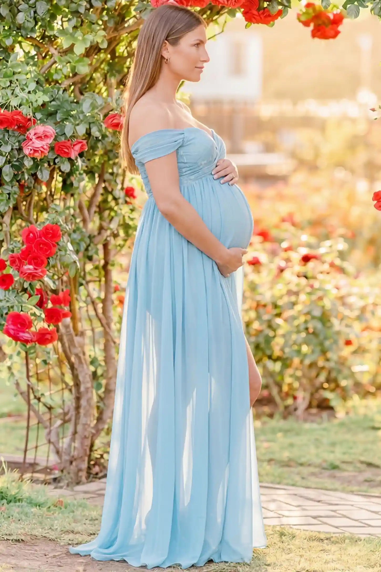 Lace Off Shoulder Slit Front Maternity Gown Lace Off Shoulder Slit Front Maternity Gown in Light Blue featuring off shoulder and flowy chiffon on a pregnant model showing side.