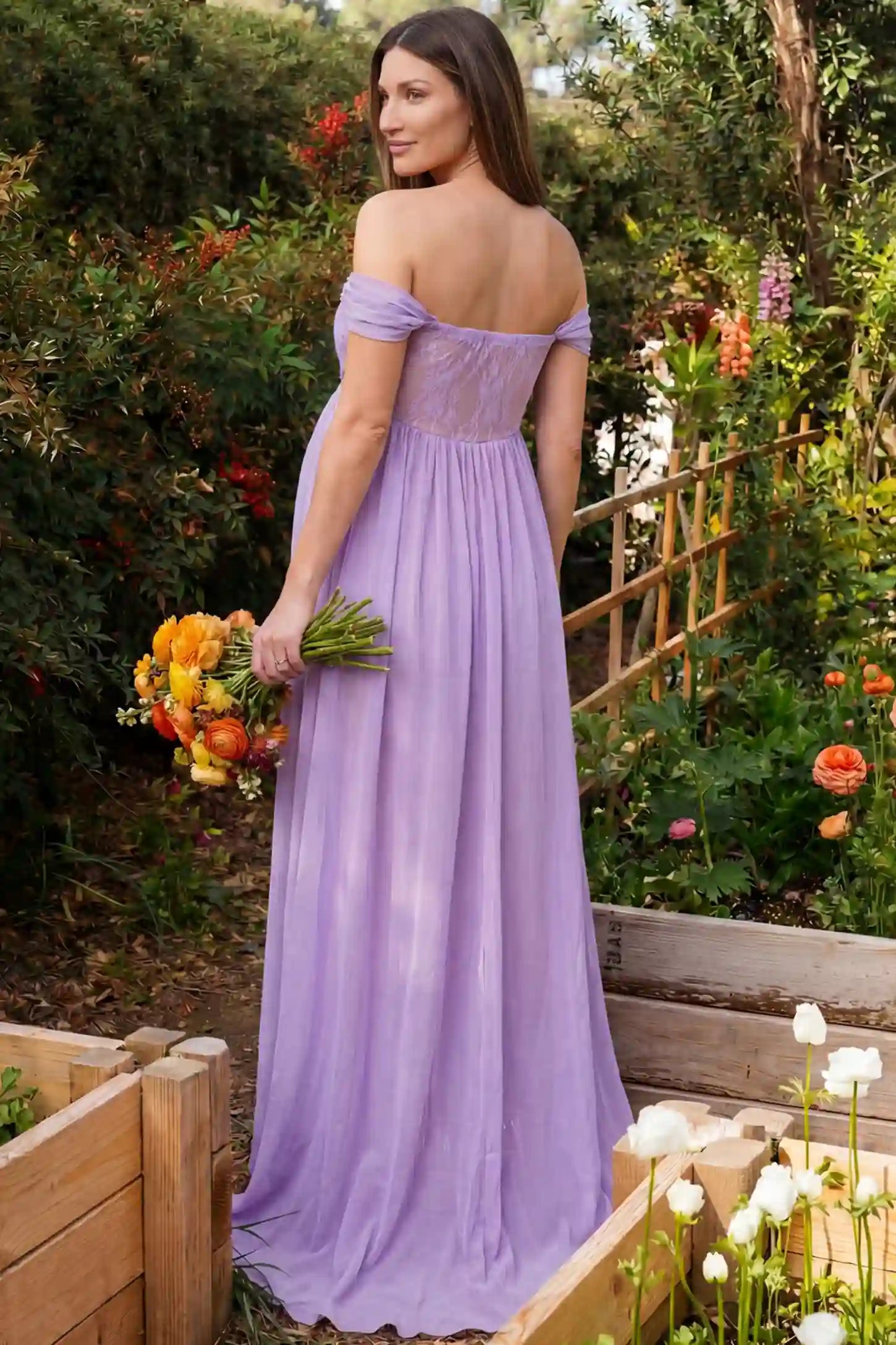 Lace Off Shoulder Slit Front Maternity Gown Lace Off Shoulder Slit Front Maternity Gown in Light Purple featuring off shoulder and flowy chiffon on a pregnant model showing back.
