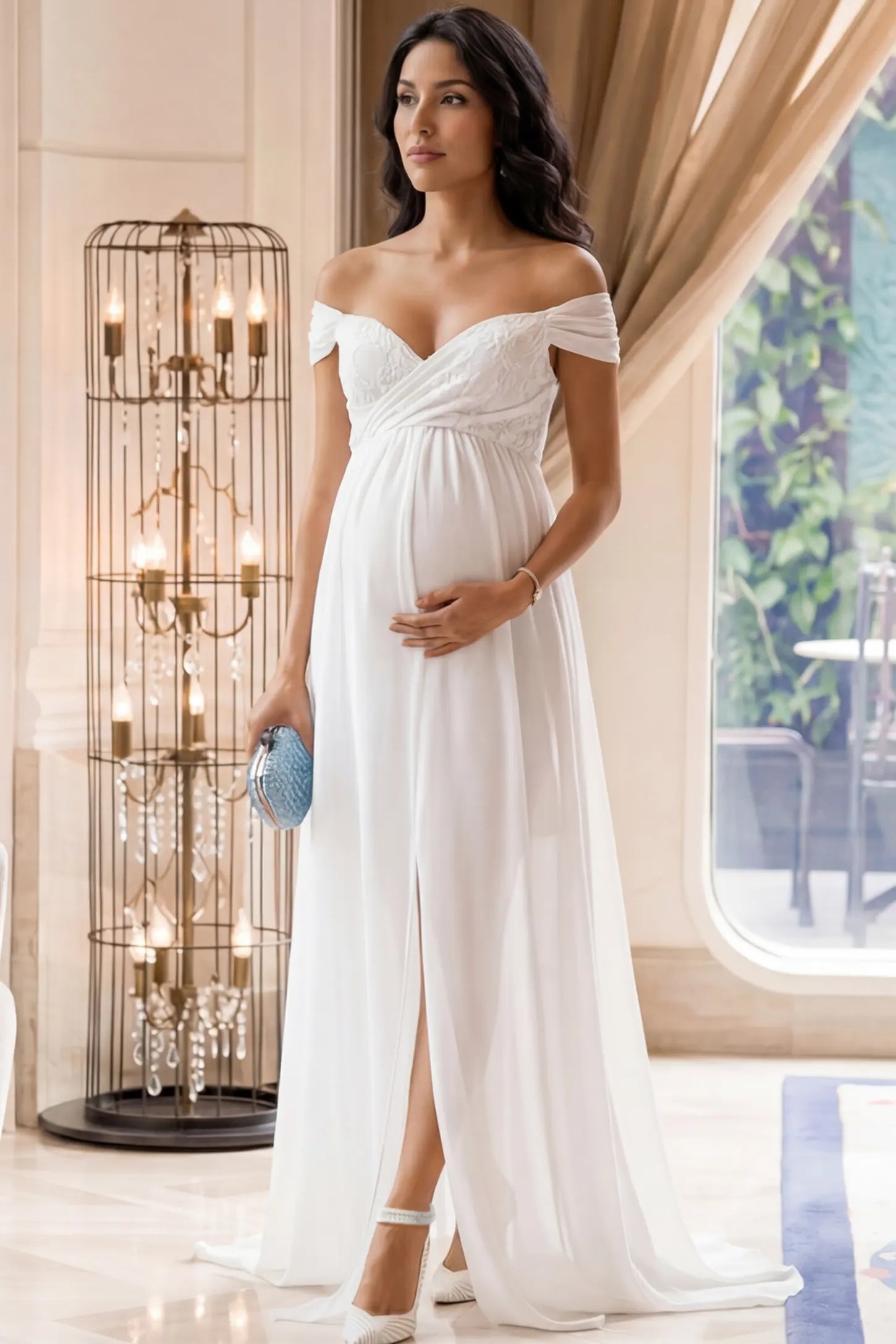 Lace Off Shoulder Slit Front Maternity Gown Lace Off Shoulder Slit Front Maternity Gown in White featuring off shoulder and high slit front on a pregnant woman during indoor photoshoot.