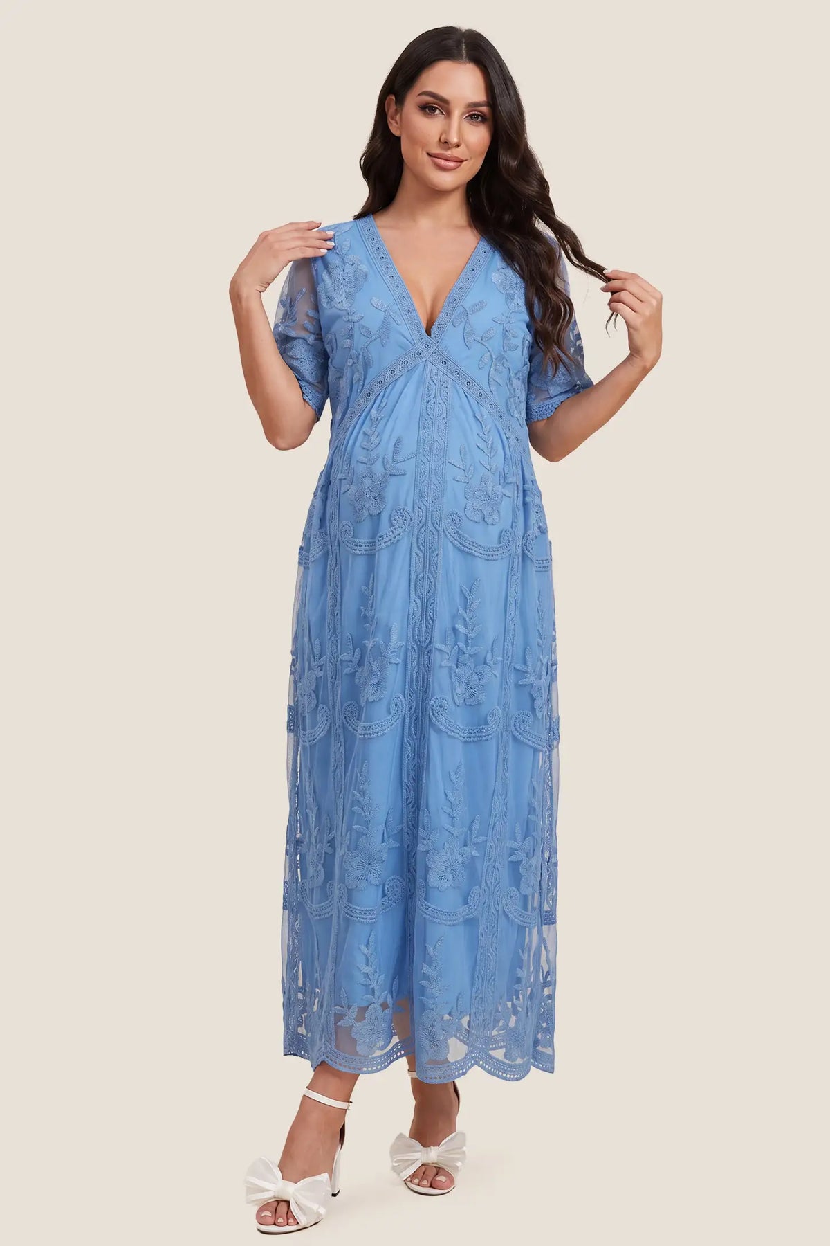 Lace Short Sheer Sleeve Maternity Maxi Dress Lace Short Sheer Sleeve Maternity Maxi Dress in Blue featuring short sheer sleeves and a floral lace overlay, front view on a pregnant model.