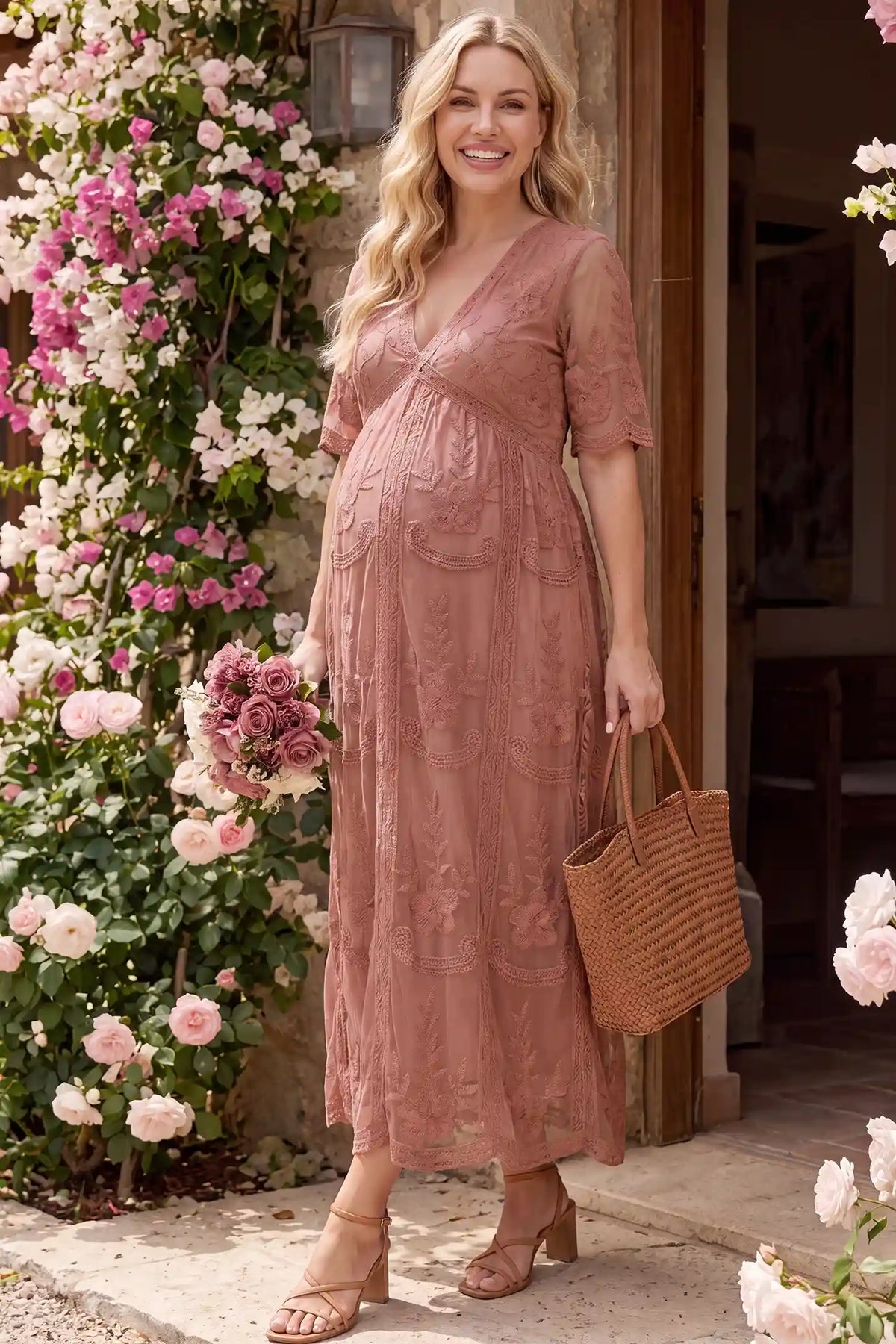 Lace Short Sheer Sleeve Maternity Maxi Dress Lace Short Sheer Sleeve Maternity Maxi Dress in Pink with delicate lace and sheer sleeves, lifestyle view on a pregnant model.