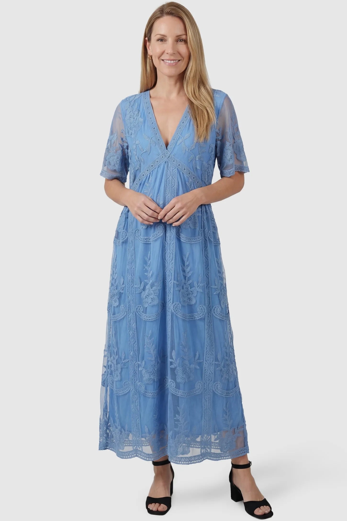 Lace Short Sheer Sleeve Maternity Maxi Dress Lace Short Sheer Sleeve Maternity Maxi Dress in blue featuring airy sheer sleeves on a non-pregnant model, postpartum view.