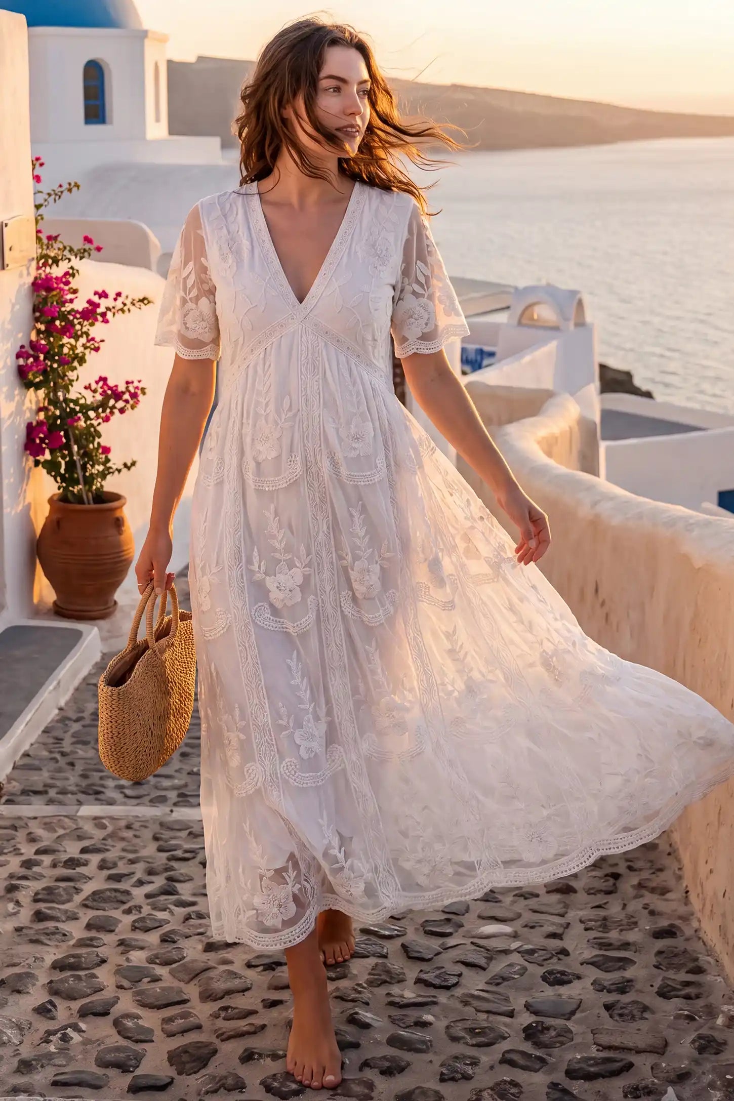 Lace Short Sheer Sleeve Maternity Maxi Dress Lace Short Sheer Sleeve Maternity Maxi Dress in white featuring an empire waist and sheer overlay on a non pregnant model, UGC view.
