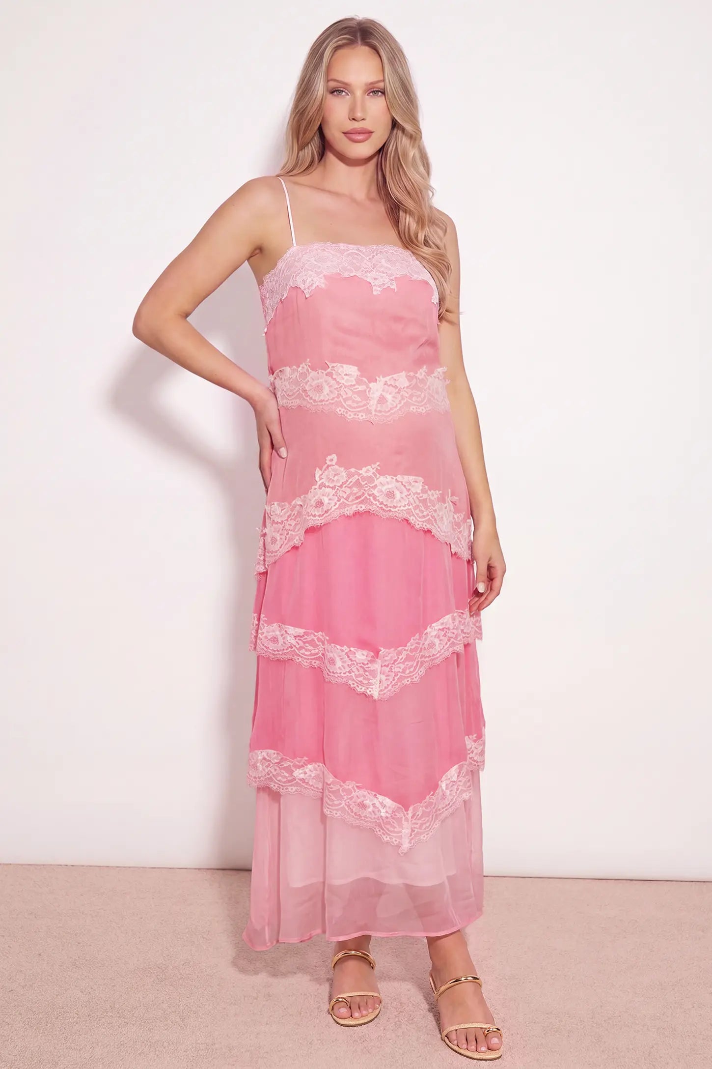 Lace Trim Lace-Up Tiered Maternity Maxi Dress Lace Trim Lace-Up Tiered Maternity Maxi Dress in Blush Pink on a pregnant model, studio front view.