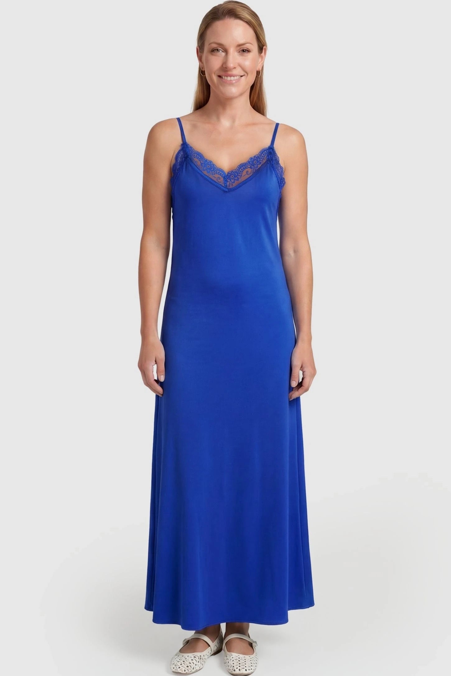 Lace-Trim Maternity Slip Dress Lace-Trim Maternity Slip Dress in Blue featuring delicate spaghetti straps on a non-pregnant model, front view.