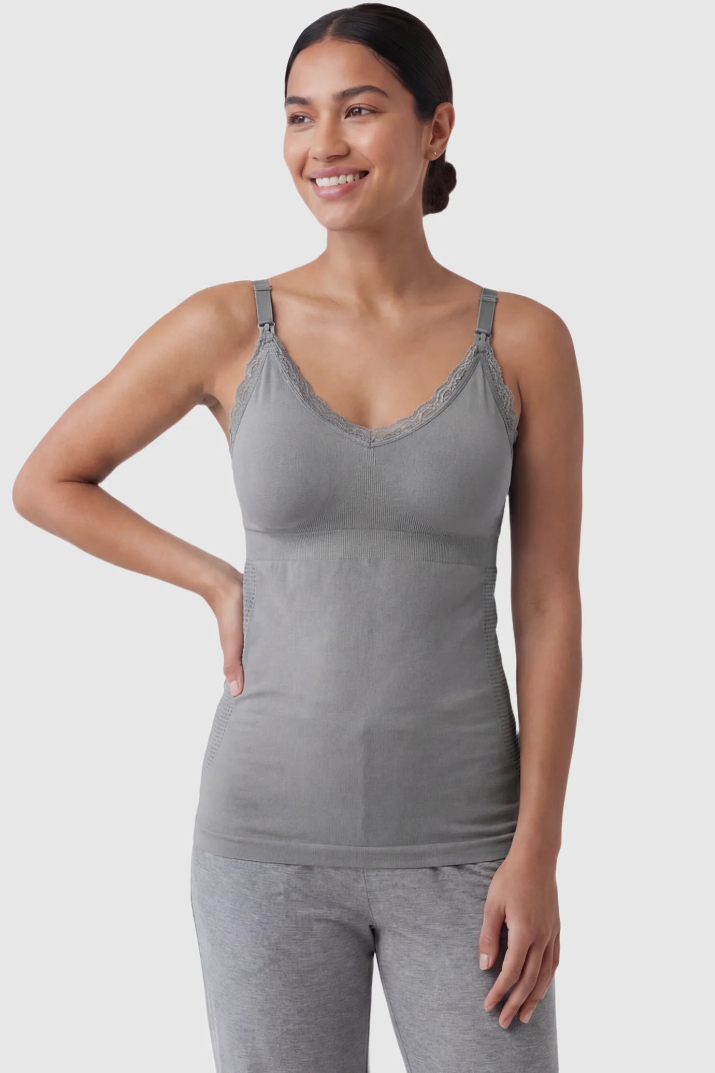 Lace Trim Wire Free Maternity Nursing Camisole Lace Trim Wire Free Maternity Nursing Camisole in gray offering one-handed nursing access on a postpartum model, front view.