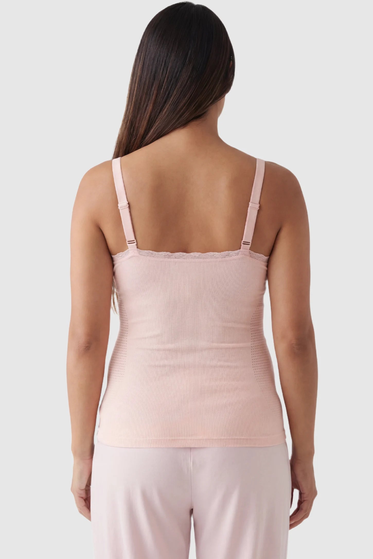 Lace Trim Wire Free Maternity Nursing Camisole Lace Trim Wire Free Maternity Nursing Camisole in light pink featuring wire free camisole on a pregnant model, back view.