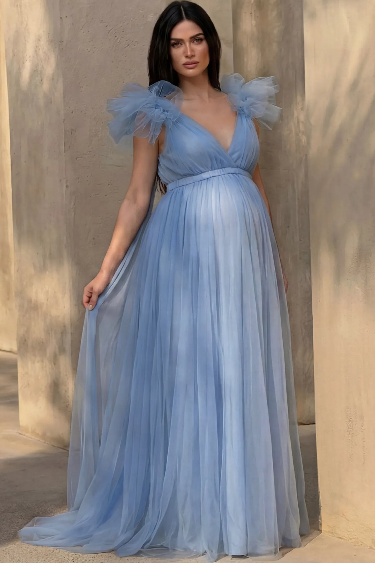 Layered Tulle Ruffle Sleeve Maternity Photoshoot Dress in Sky Blue featuring dramatic tulle sleeves on a pregnant model, front view.