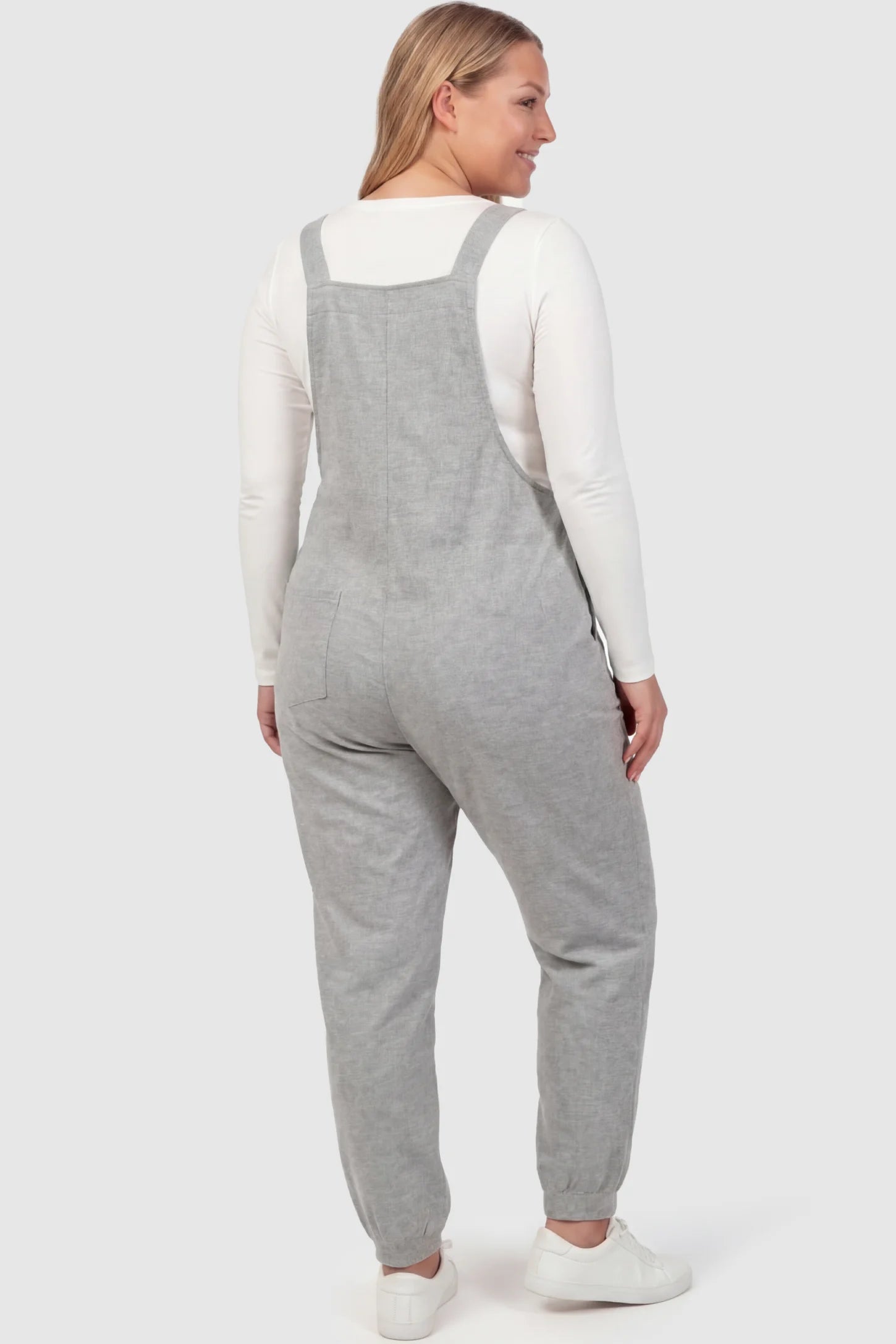 Square Neck Pocketed Maternity Jogger Jumpsuit Sleeveless Square Neck Maternity Jogger Jumpsuit in Gray Jersey Knit on a pregnant model.