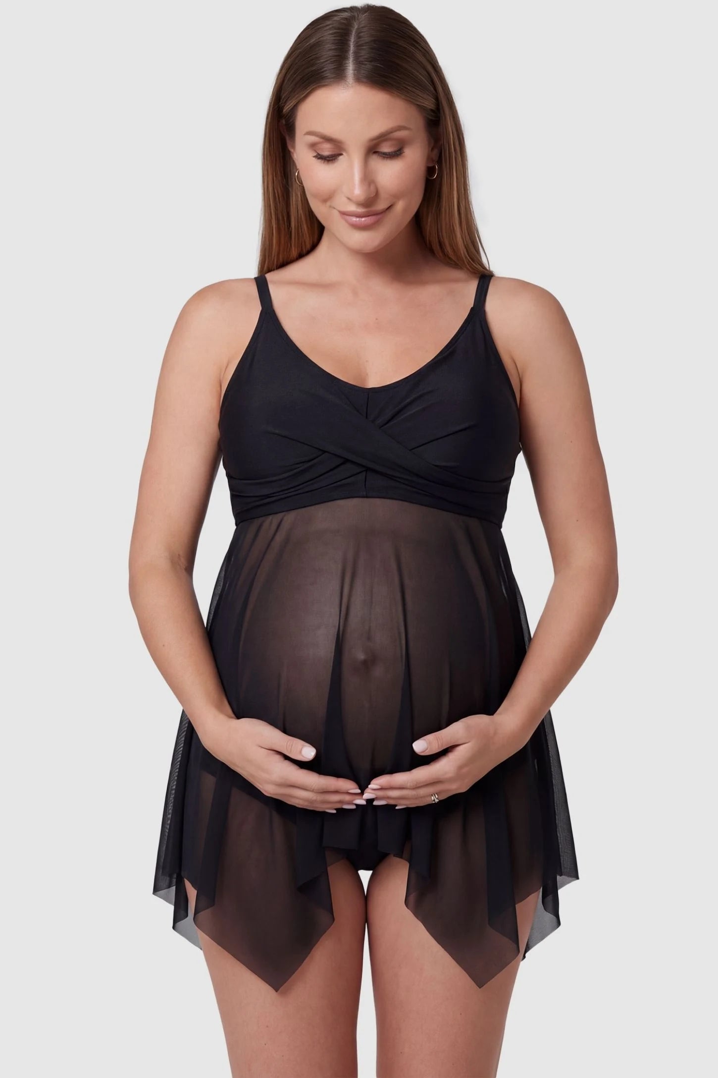 Mesh Overlay Crisscross Back Maternity Bikini Set in Black featuring a chic wrap-style bust on a pregnant model, front view.