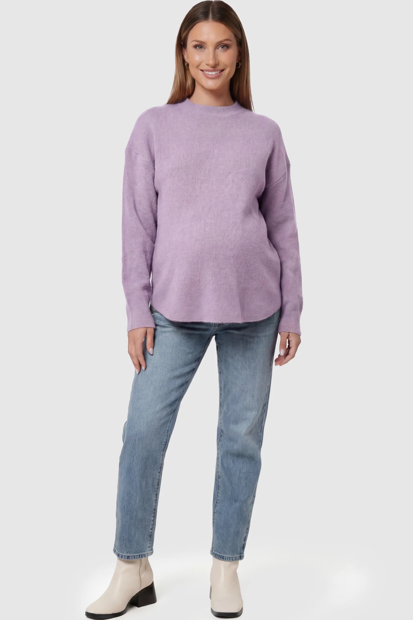 Mock Neck Long Sleeve Maternity Sweater Mock Neck Long Sleeve Maternity Sweater in Lavender thickened woolen fabric on a pregnant model posing front.