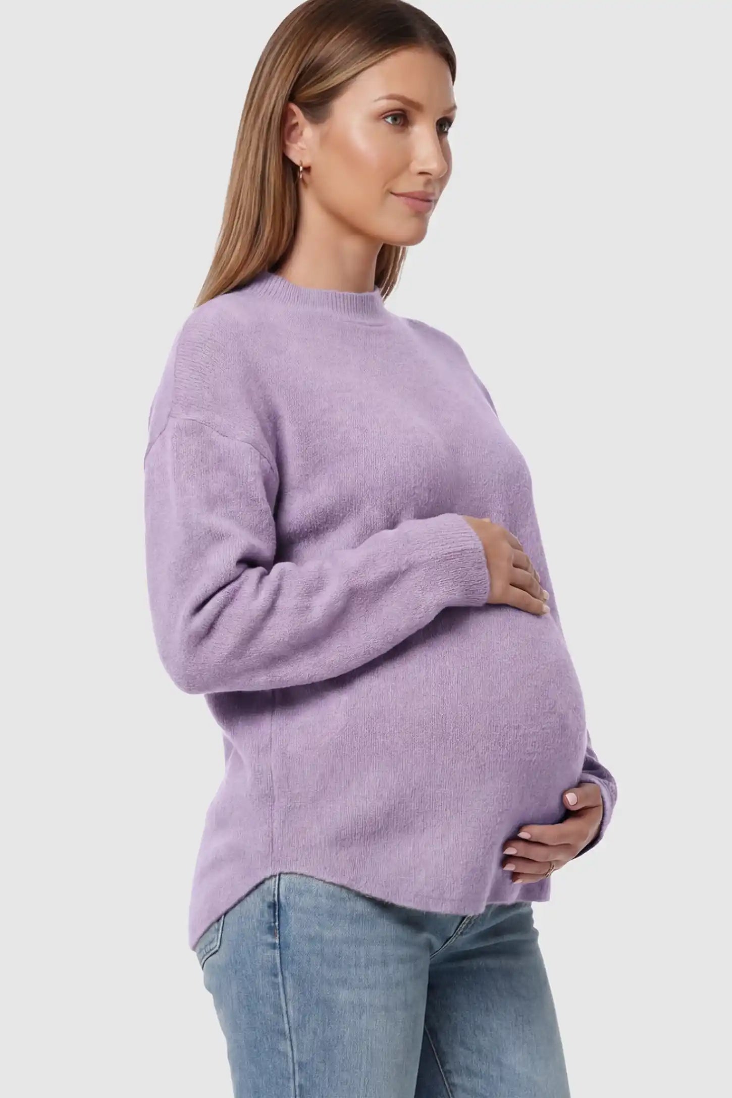 Mock Neck Long Sleeve Maternity Sweater Mock Neck Long Sleeve Maternity Sweater in Lavender thickened woolen fabric on a pregnant model showing side.