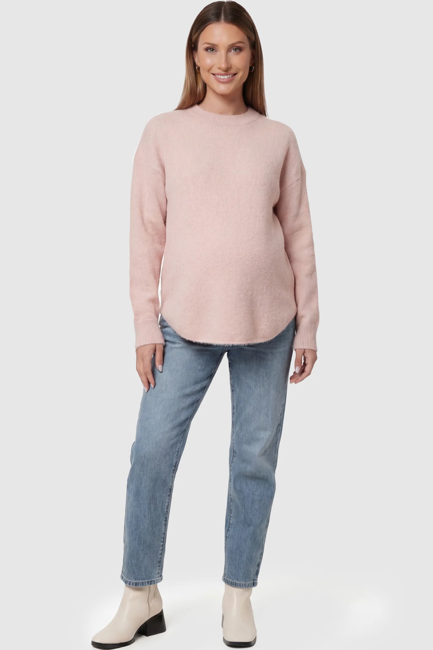 Mock Neck Long Sleeve Maternity Sweater Mock Neck Long Sleeve Maternity Sweater in Pink thickened woolen fabric on a pregnant model posing front.