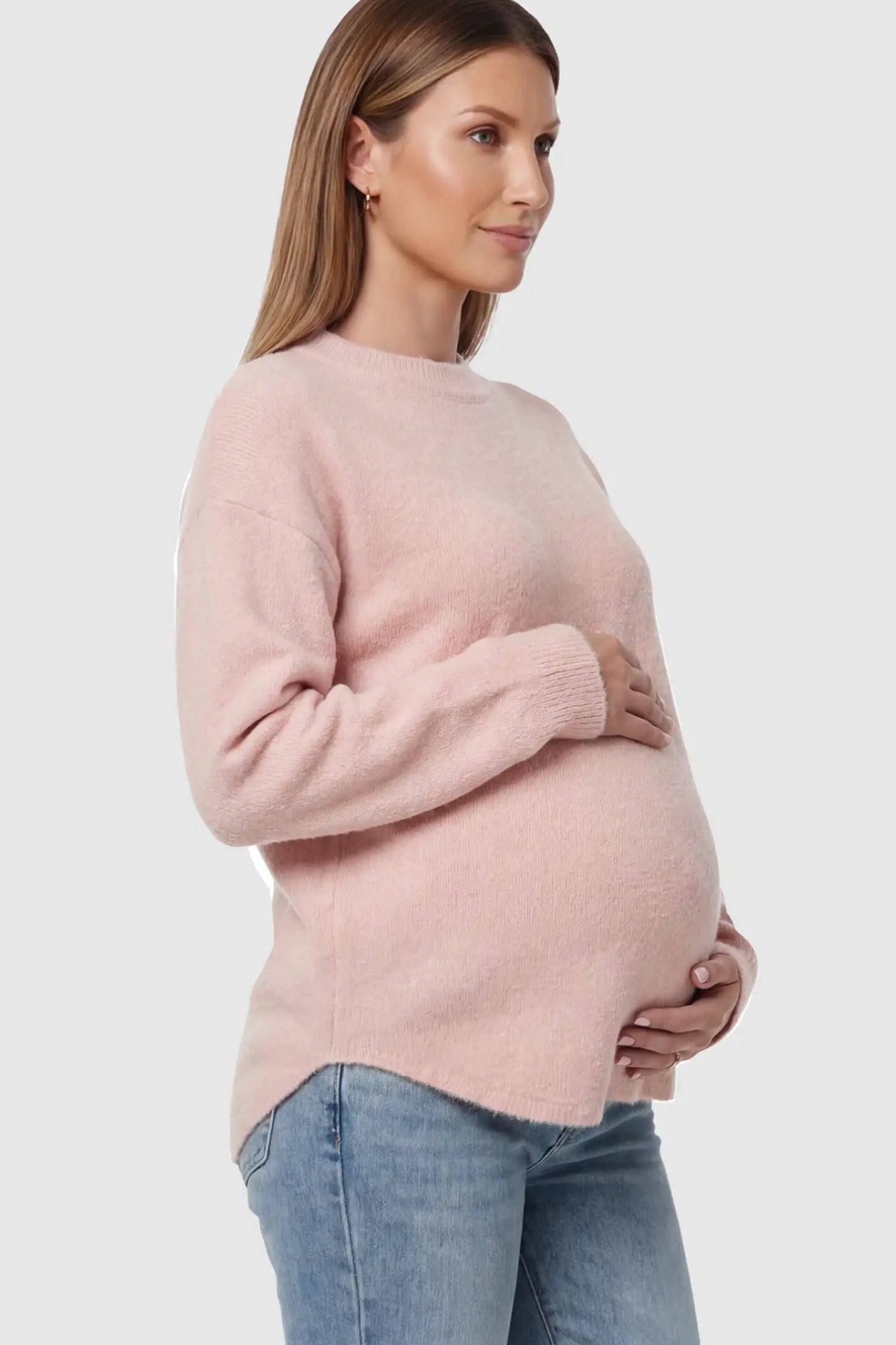 Mock Neck Long Sleeve Maternity Sweater Mock Neck Long Sleeve Maternity Sweater in Pink thickened woolen fabric on a pregnant model showing side.