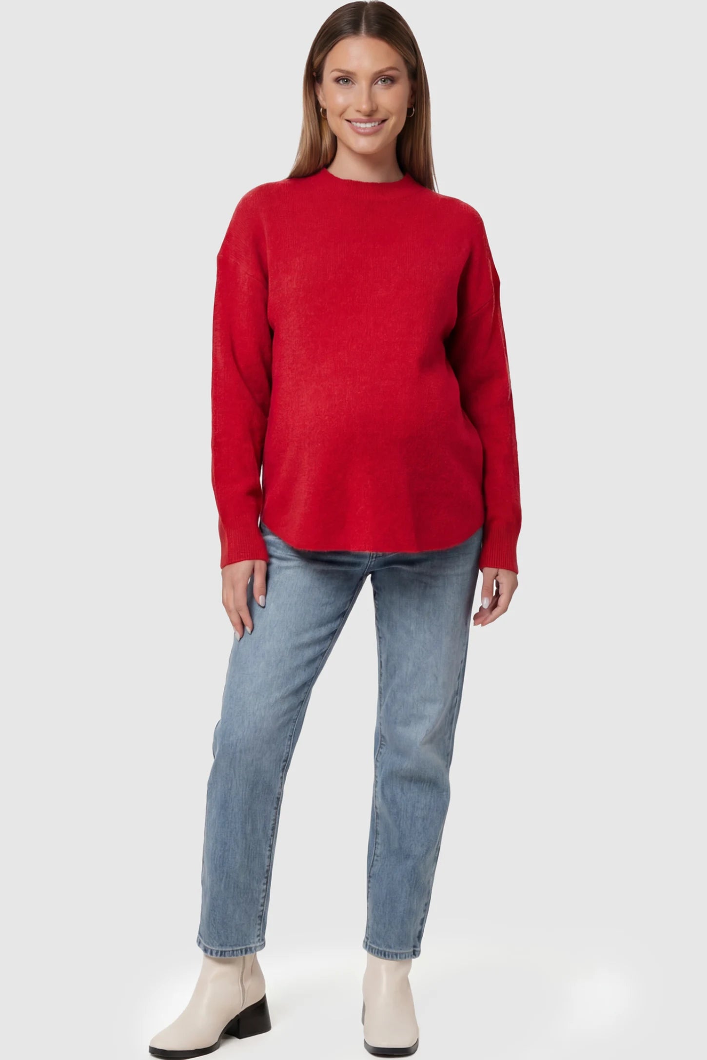 Mock Neck Long Sleeve Maternity Sweater Mock Neck Long Sleeve Maternity Sweater in Red thickened woolen fabric on a pregnant model posing front.