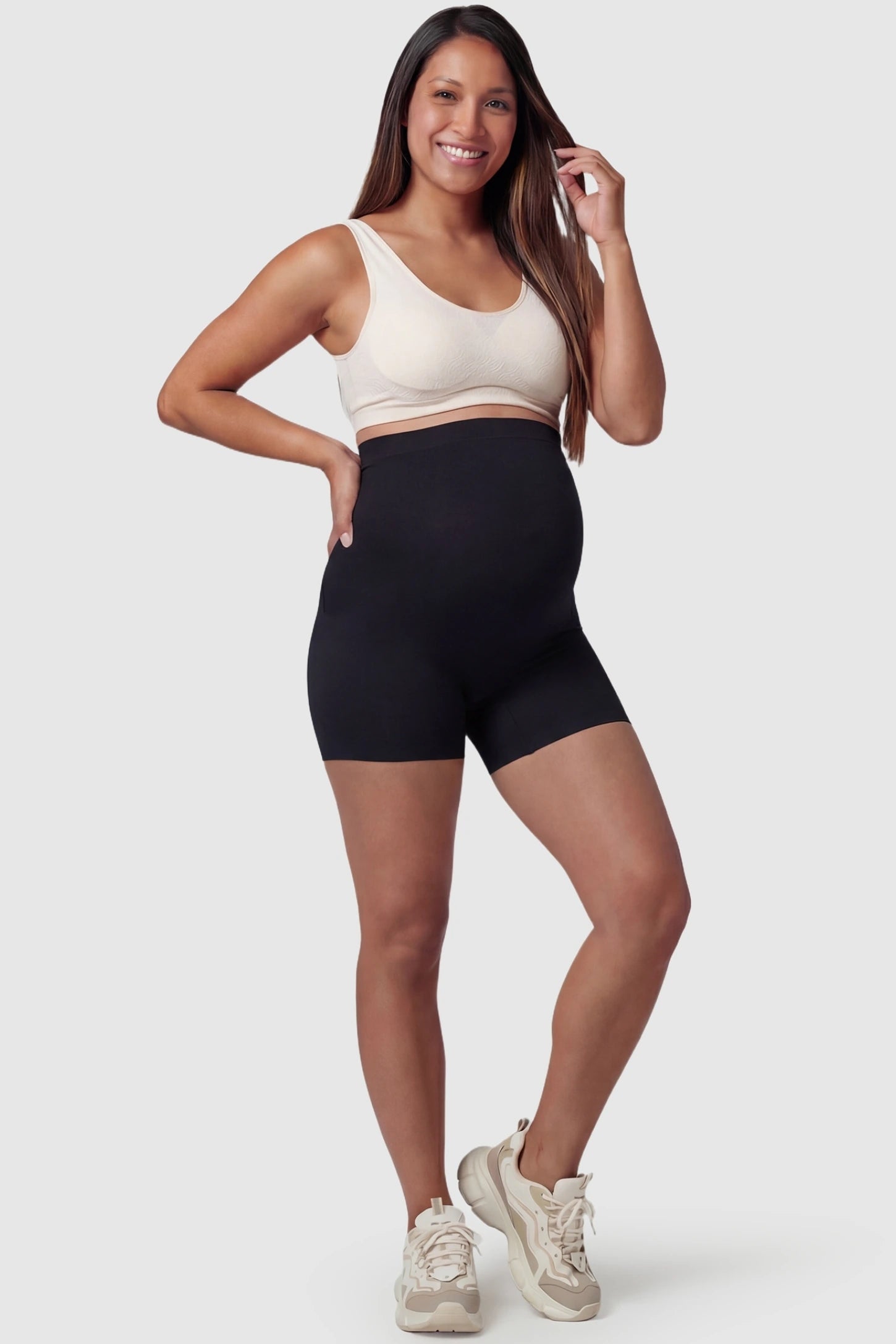 Over Bump Seamless Maternity Shapewear Shorts Over Bump Seamless Maternity Shapewear Shorts in Black featuring a high-waist support panel in a front view on a pregnant model.