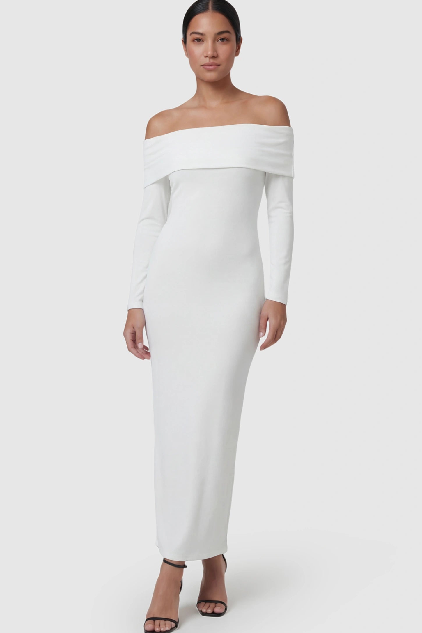 Solid Off Shoulder Bodycon Maternity Maxi Dress Off Shoulder Bodycon Maternity Maxi Dress in White featuring a smooth stretch finish on a postpartum model.