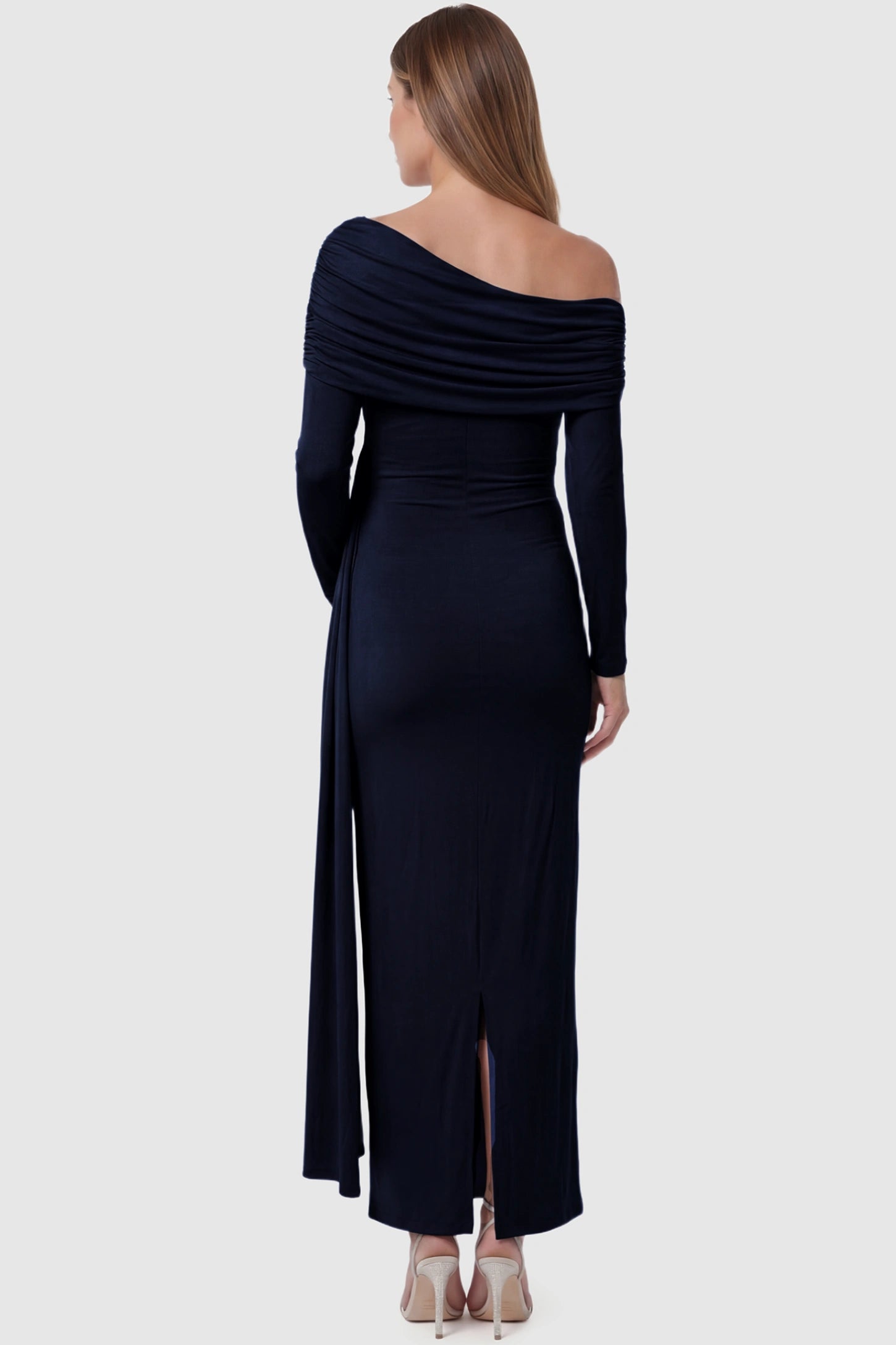 Off Shoulder Draped Wrap Bodycon Maternity Maxi Dress Off Shoulder Draped Wrap Bodycon Maternity Maxi Dress in Navy Blue featuring side ruching and long sleeves on a pregnant model back view.
