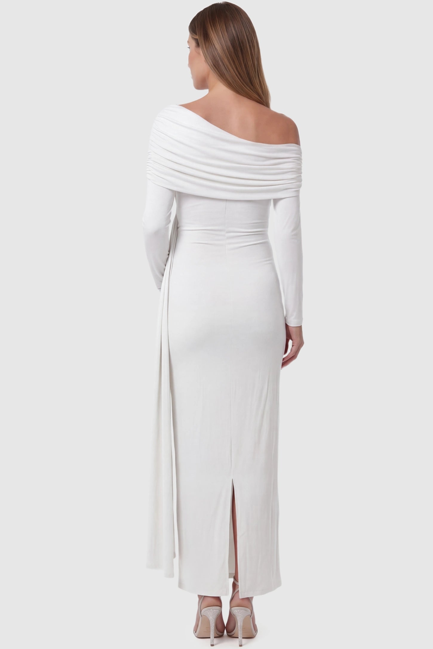 Off Shoulder Draped Wrap Bodycon Maternity Maxi Dress Off Shoulder Draped Wrap Bodycon Maternity Maxi Dress in White featuring side ruching and long sleeves on a pregnant model back view.