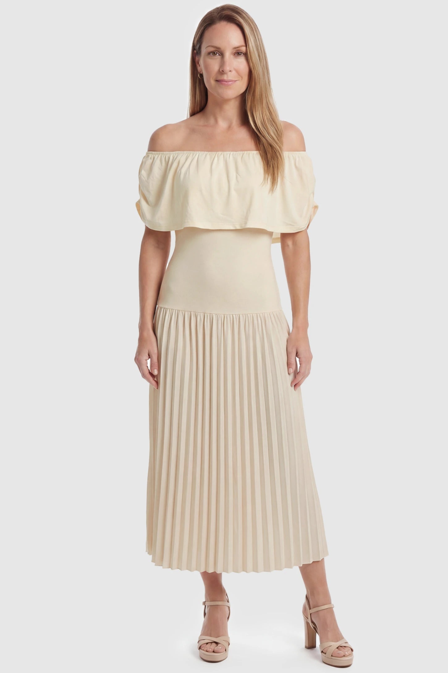 Pleated Off Shoulder Maternity Maxi Dress Pleated Off Shoulder Maternity Maxi Dress  in Beige featuring a high stretch pleated maxi skirt on a postpartum model, front view.