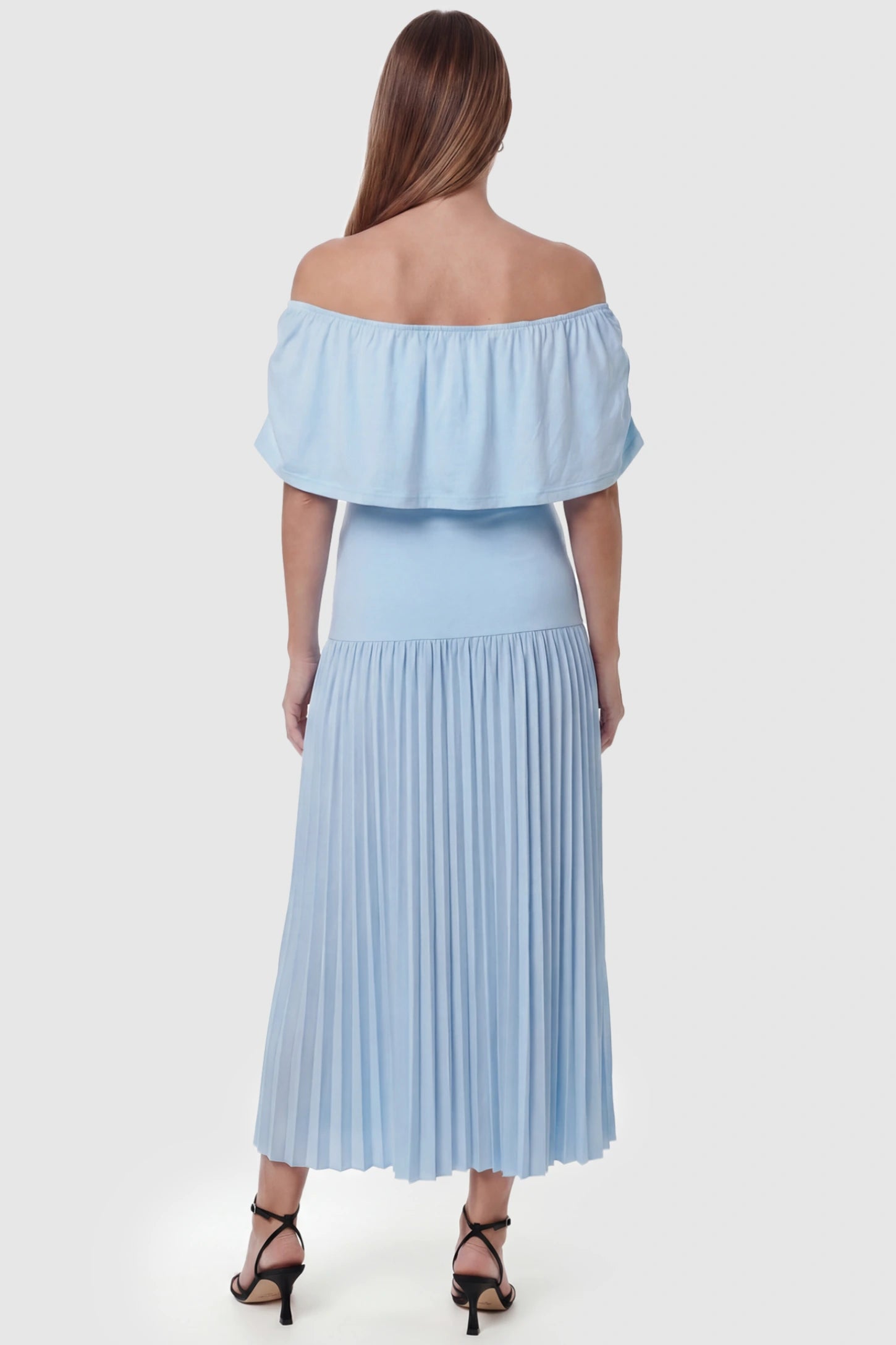 Pleated Off Shoulder Maternity Maxi Dress Pleated Off Shoulder Maternity Maxi Dress  in Light Blue featuring a high stretch pleated maxi skirt on a pregnant model, back view.
