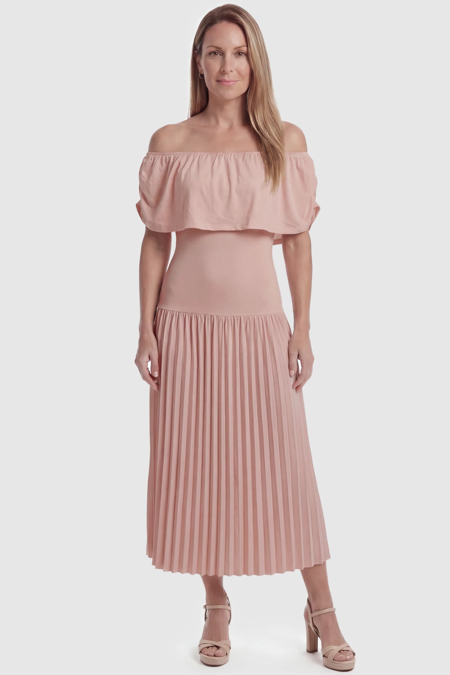 Pleated Off Shoulder Maternity Maxi Dress Pleated Off Shoulder Maternity Maxi Dress  in Pink featuring a high stretch pleated maxi skirt on a postpartum model, front view.