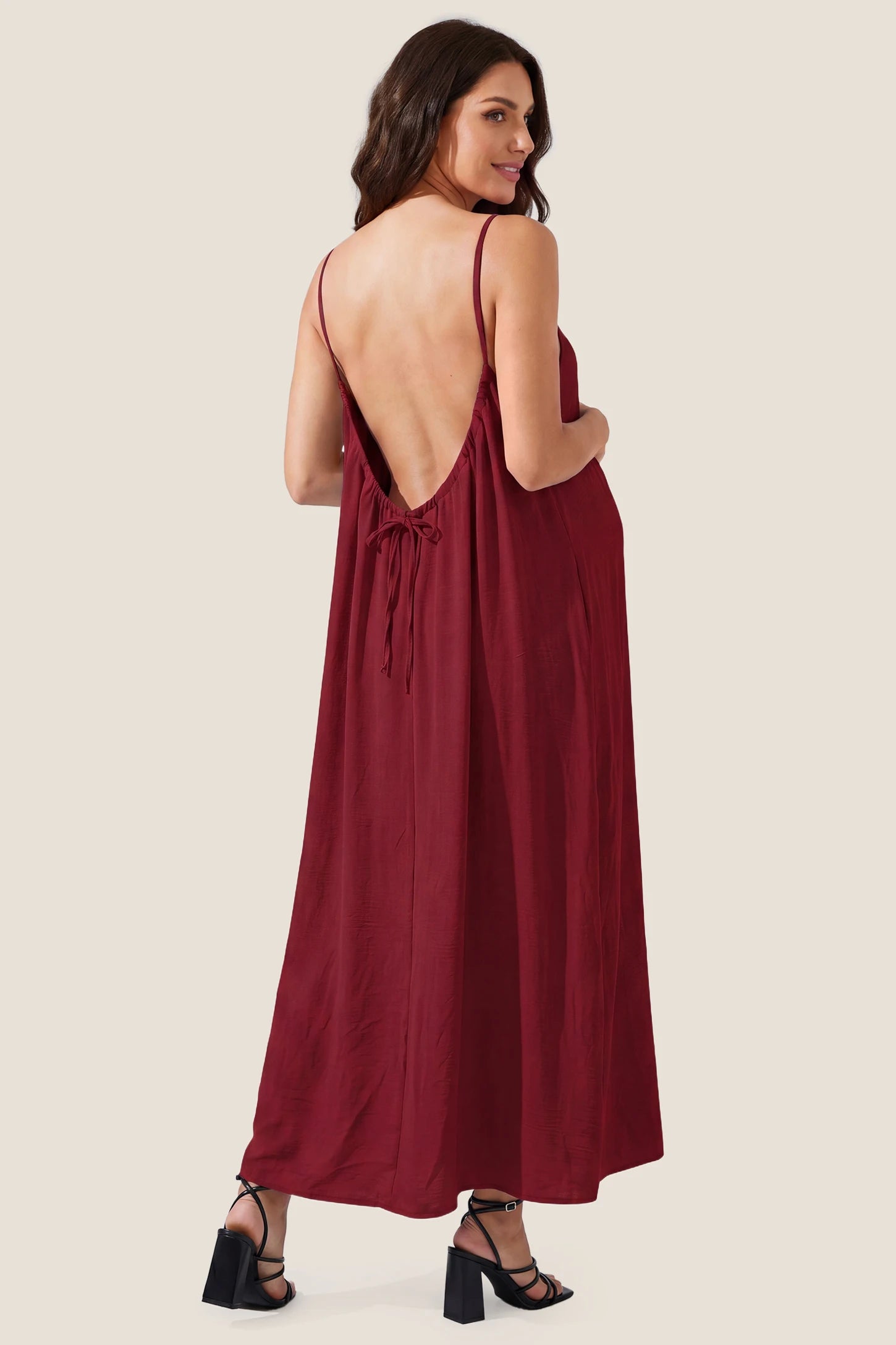 Open Back Flowy Cami Maternity Dress Open Back Flowy Cami Long Maternity Dress in Date Red showcasing the elegant open back, back view on a pregnant model.