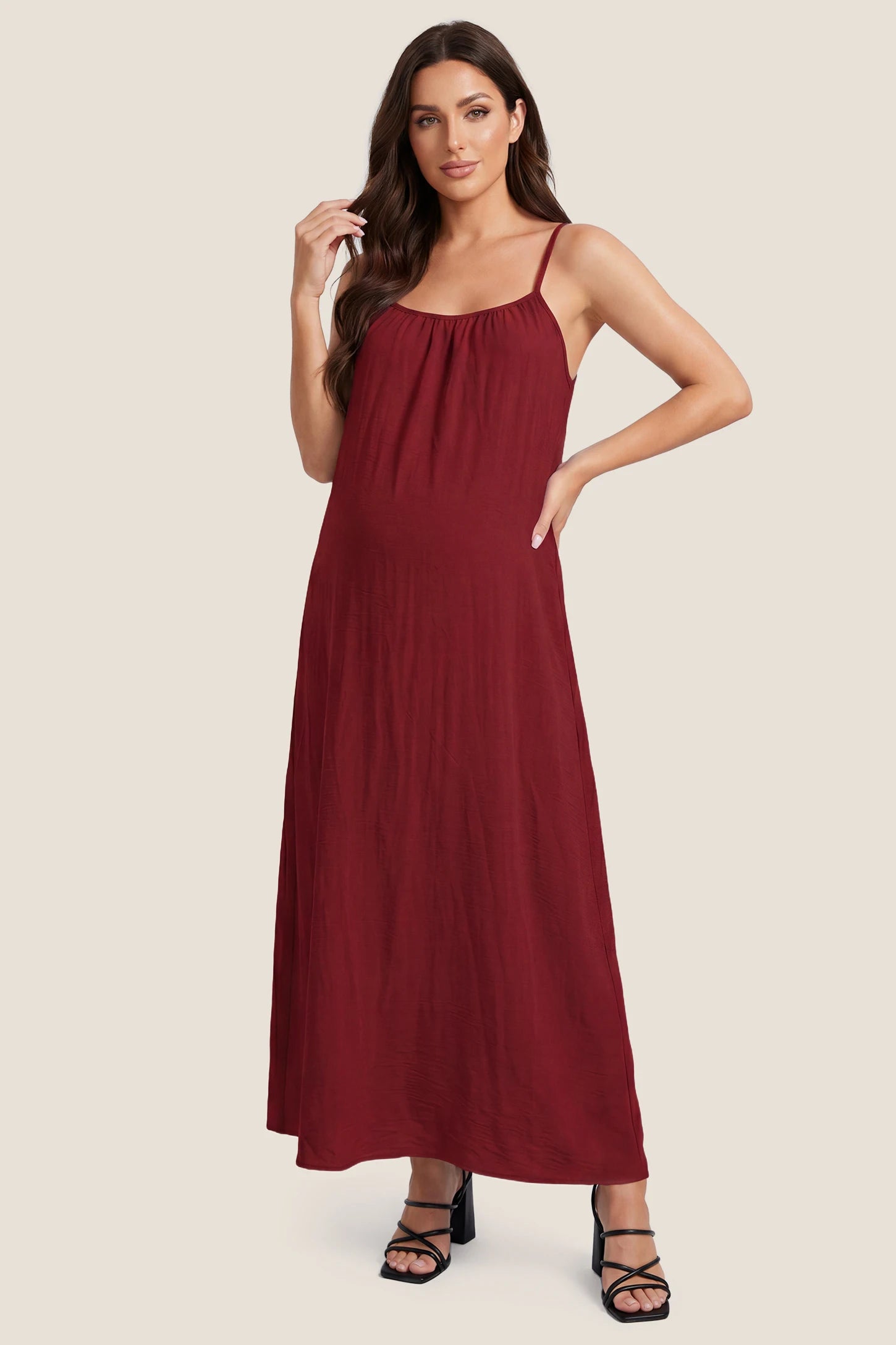 Open Back Flowy Cami Maternity Dress Open Back Flowy Cami Long Maternity Dress in Date Red featuring open back details and flowy cami straps, front view on a pregnant model.