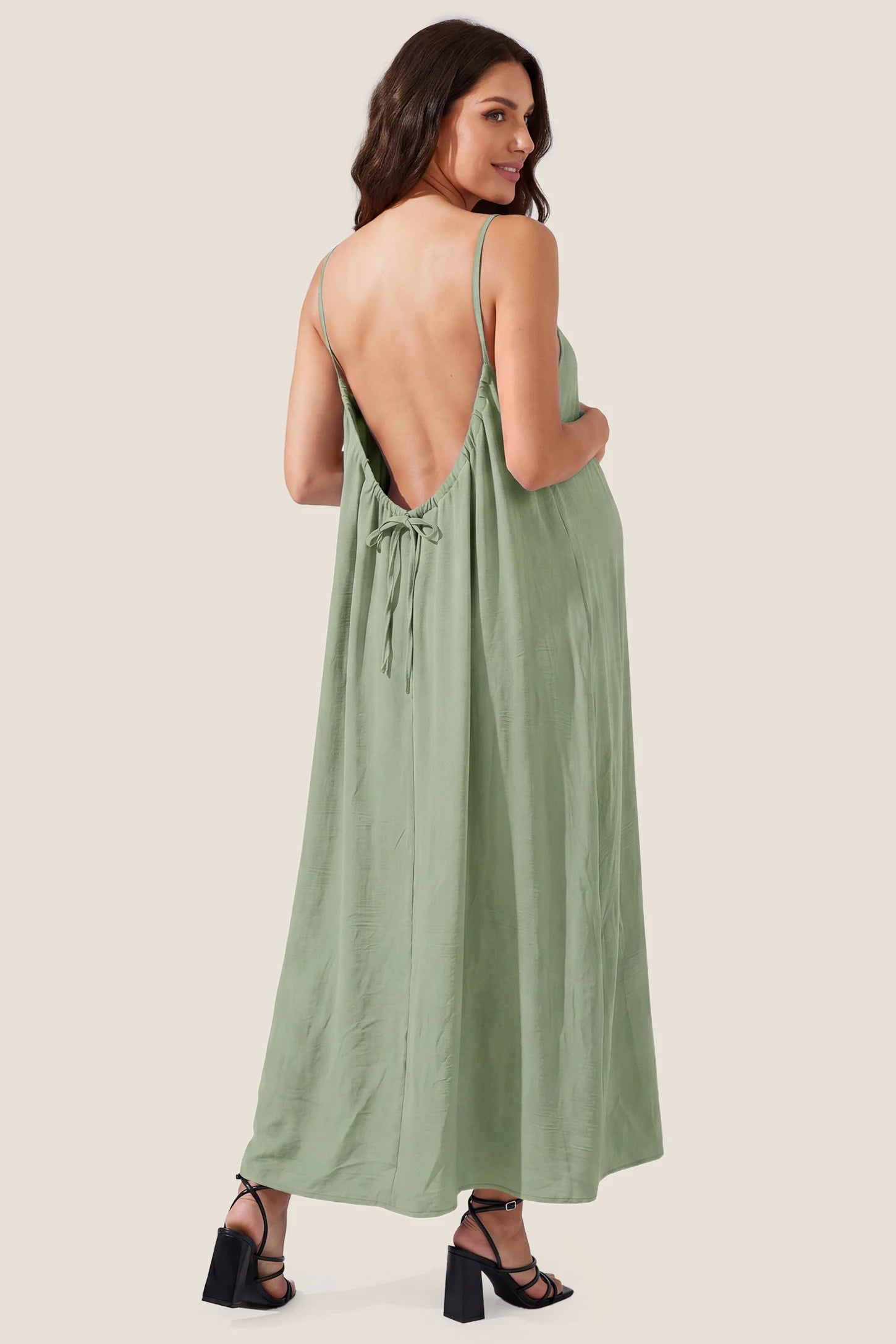Open Back Flowy Cami Maternity Dress Open Back Flowy Cami Long Maternity Dress in Military Green showcasing the elegant open back, back view on a pregnant model.
