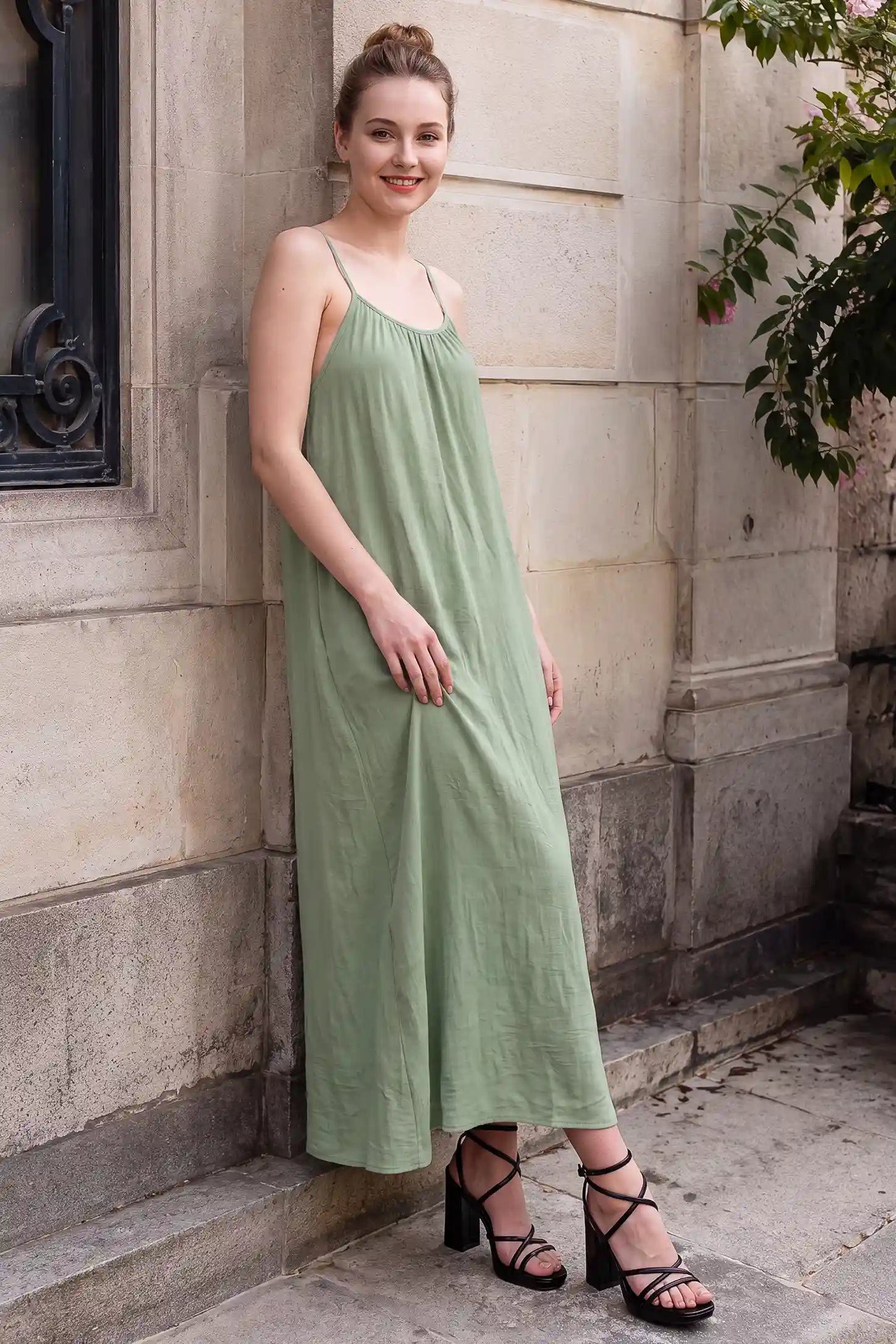 Open Back Flowy Cami Maternity Dress Open Back Flowy Cami Maternity Dress in Military Green long length with a breezy open back, lifestyle view on a non pregnant model.